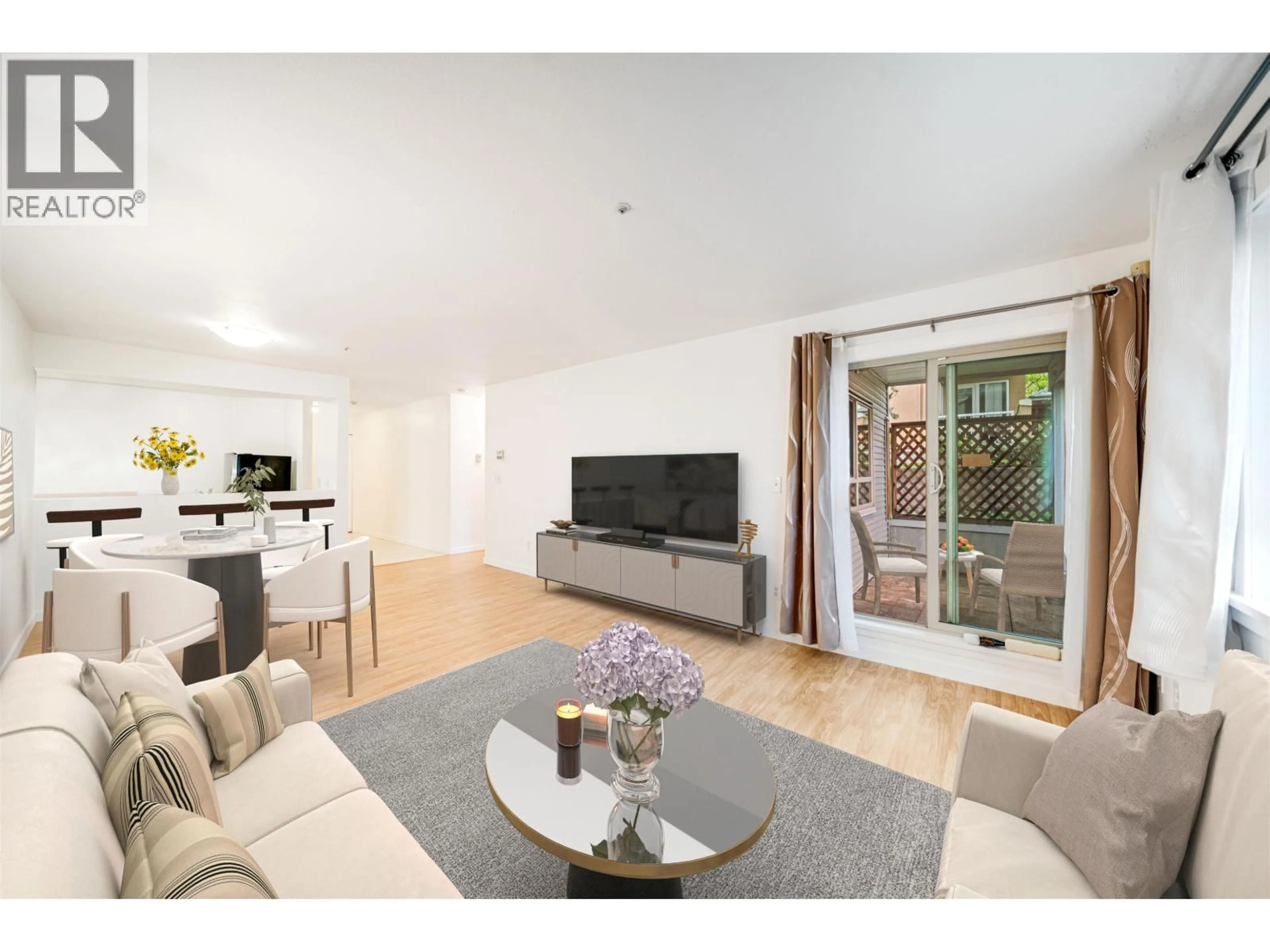 Living room with furniture, wood/laminate floor for 110 - 1615 FRANCES STREET, Vancouver British Columbia V5L1Z3