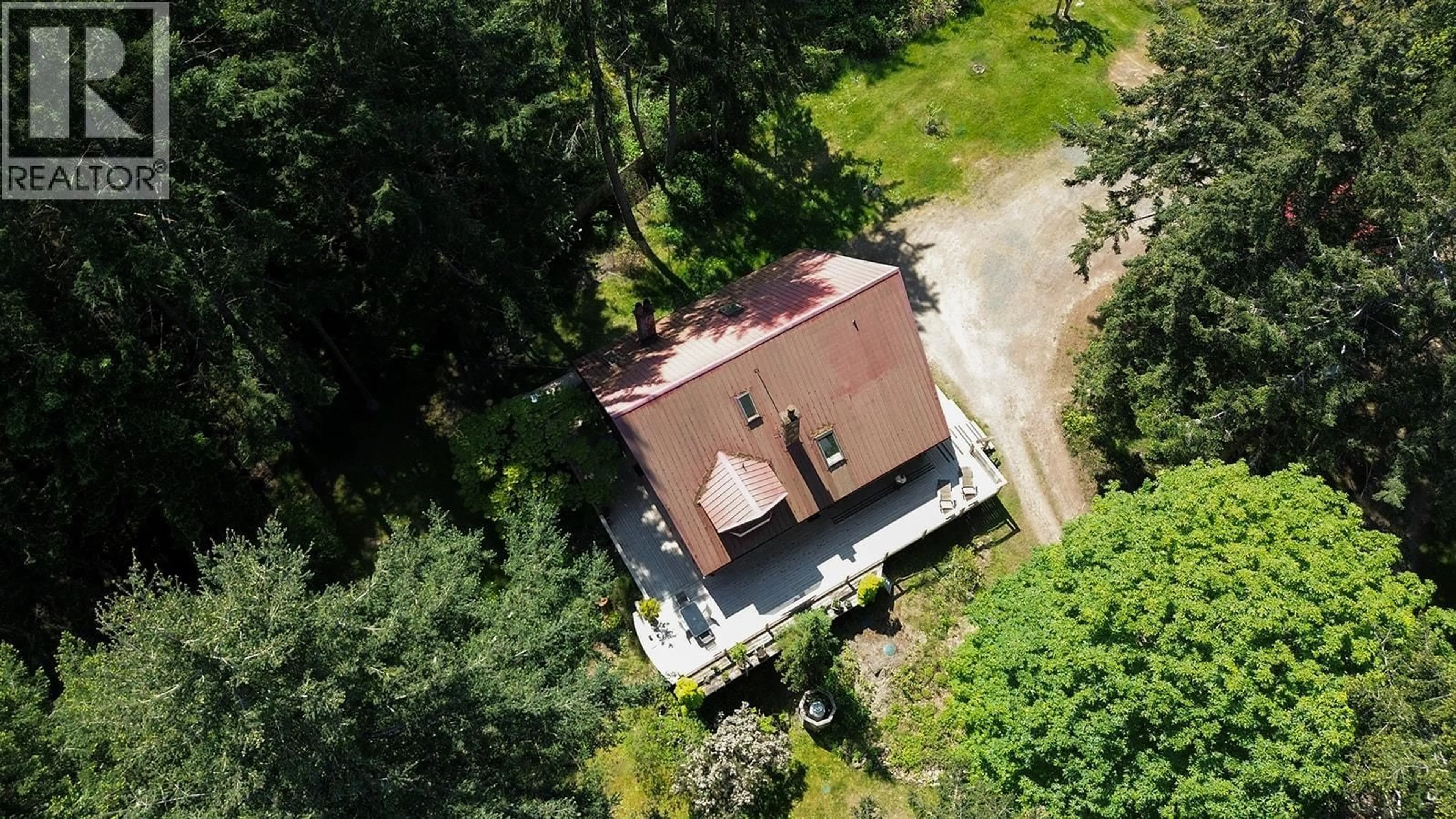 A pic from outside/outdoor area/front of a property/back of a property/a pic from drone, unknown for 754 BURRILL ROAD, Galiano Island British Columbia V0N1P0