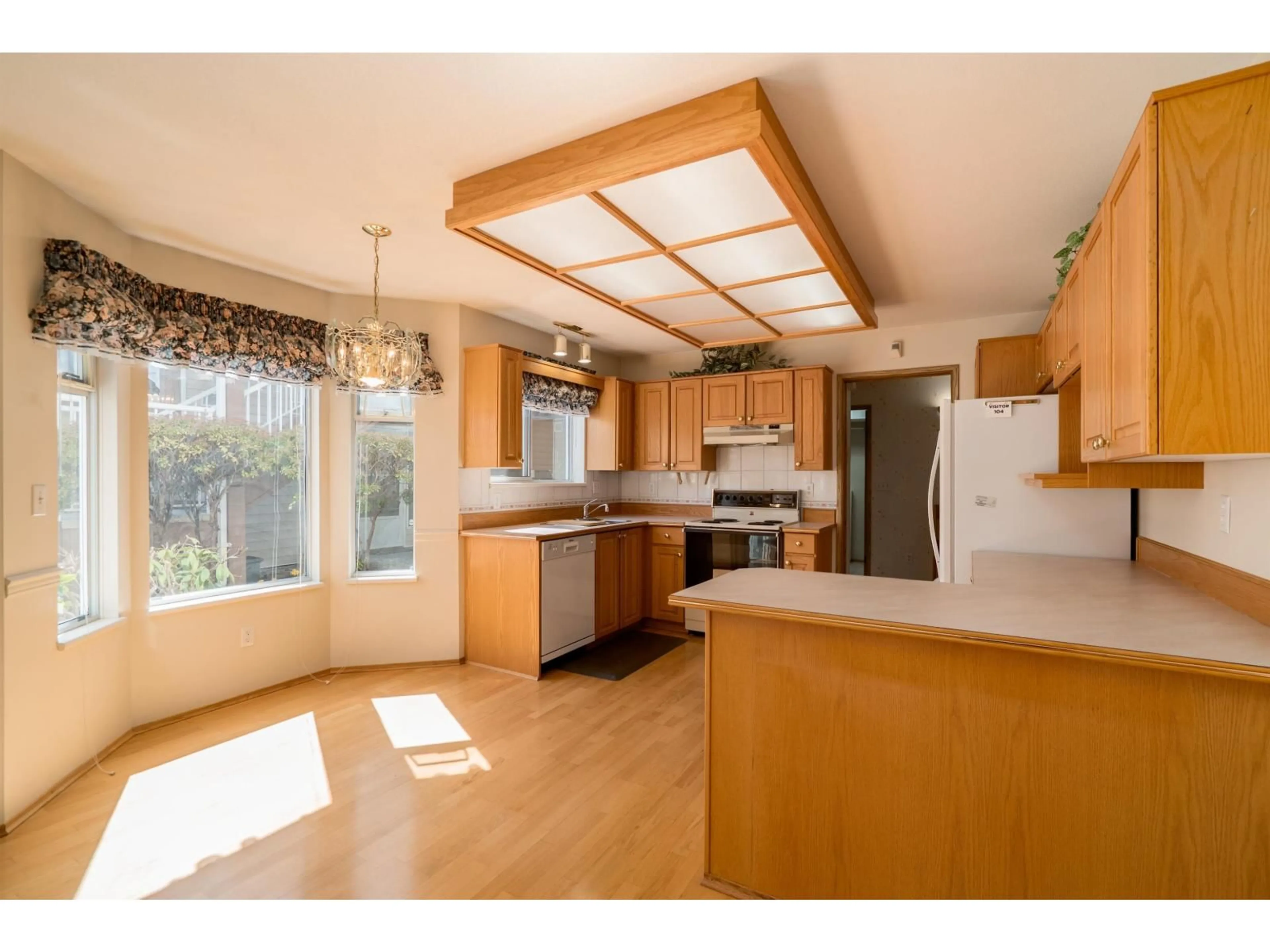 Open concept kitchen, unknown for 104 - 6875 121 STREET, Surrey British Columbia V3W1C2