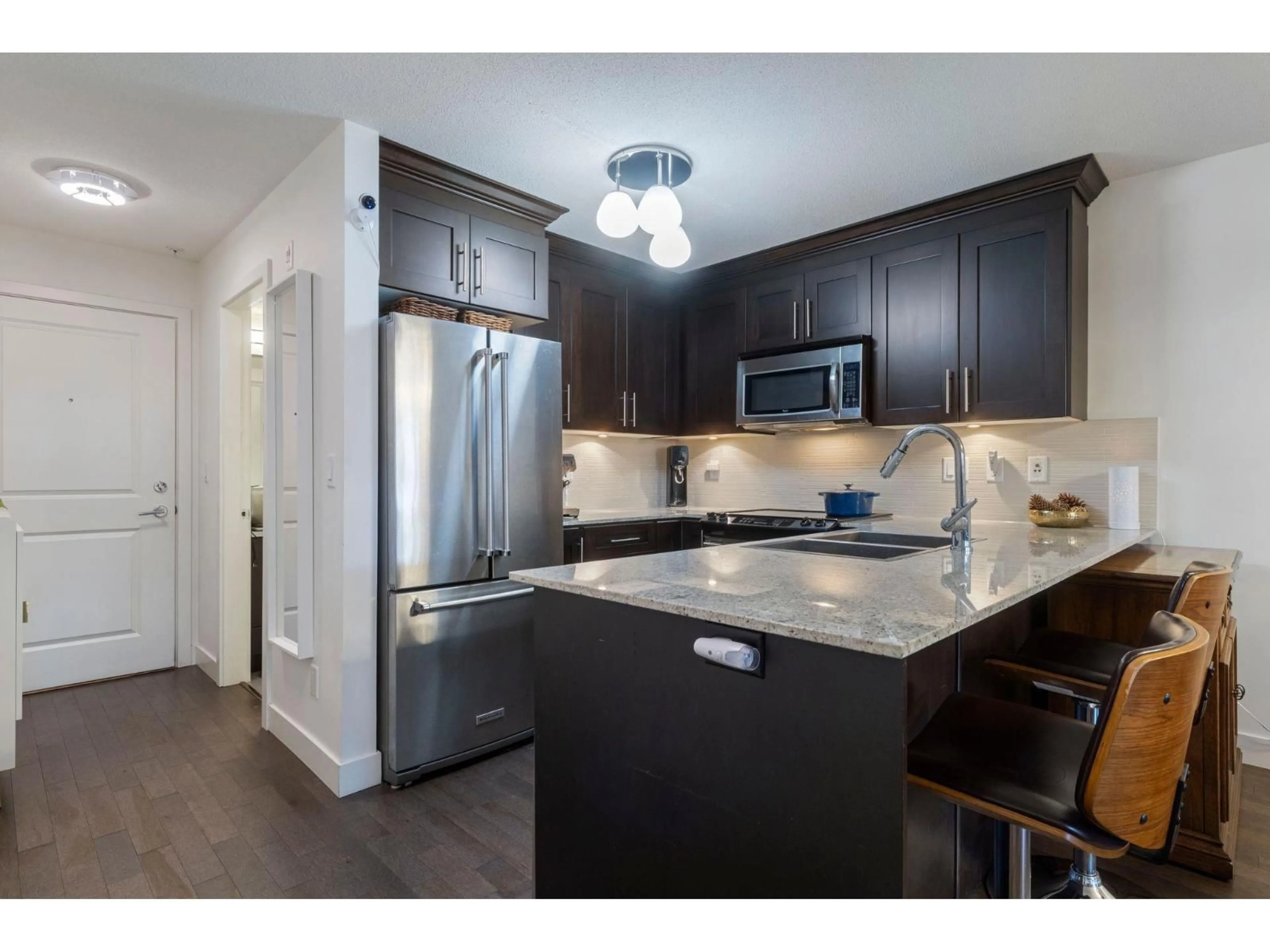 Open concept kitchen, unknown for 105 - 8915 202 STREET, Langley British Columbia V1M0B5