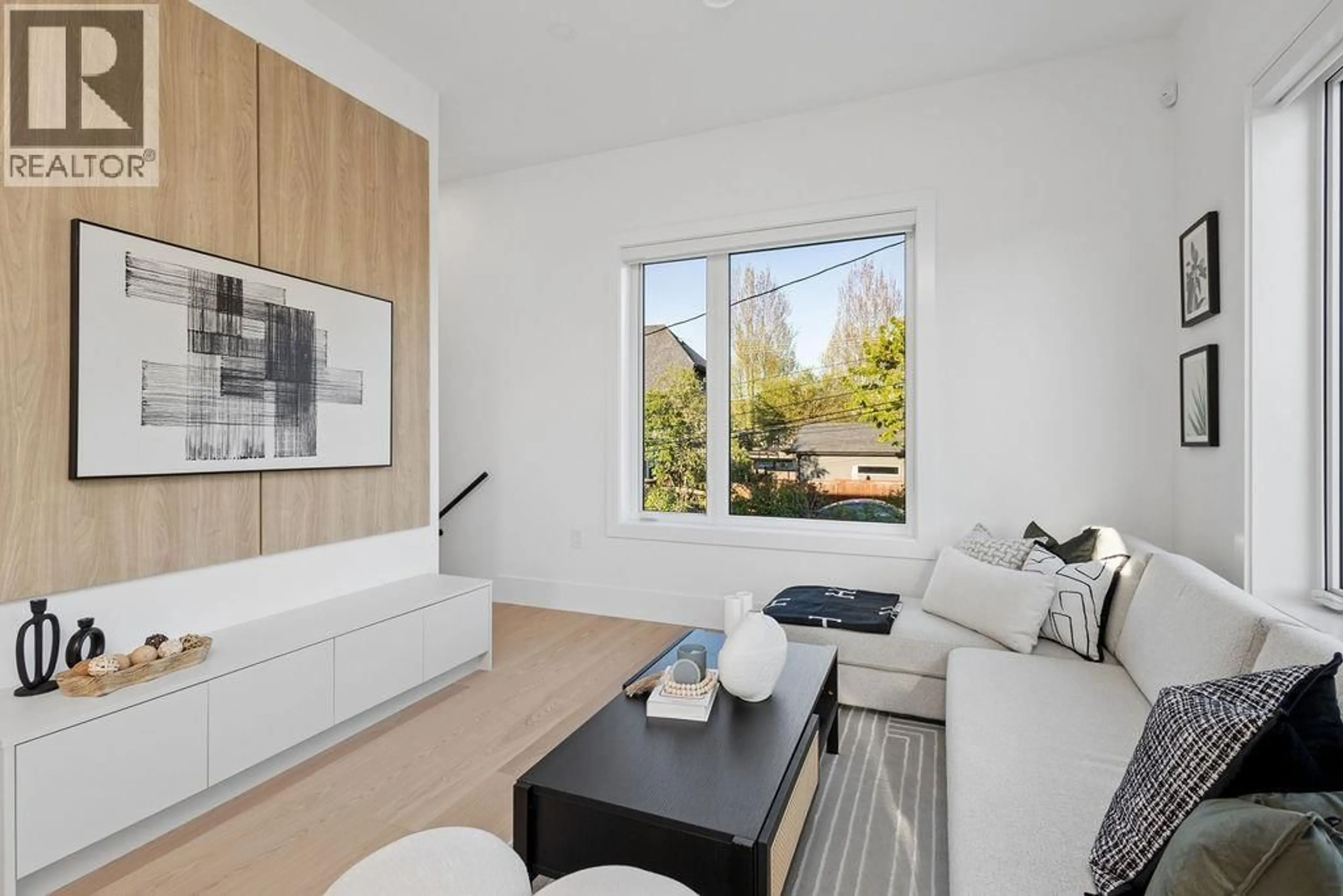 Living room with furniture, wood/laminate floor for 2754 GRAVELEY STREET, Vancouver British Columbia V5K3J7
