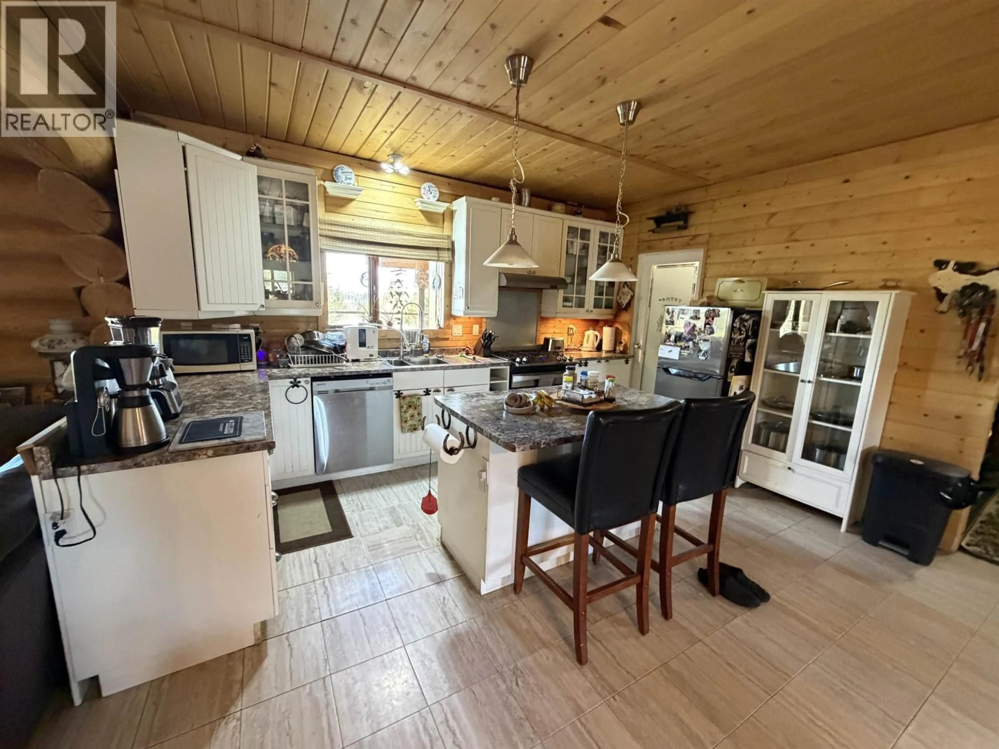 Open concept kitchen, wood/laminate floor for 6779 LITTLE FORT HWY 24 HIGHWAY, Lone Butte British Columbia V0K1X1