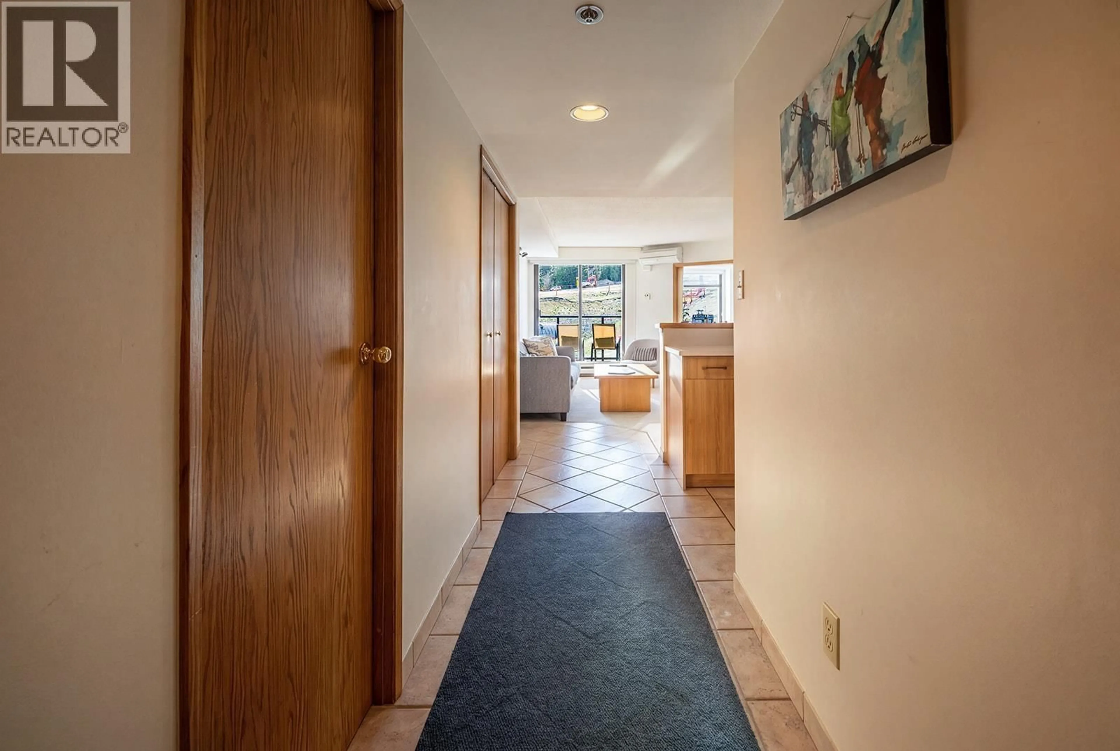 Indoor foyer for 303 - 4280 MOUNTAIN SQUARE, Whistler British Columbia V8E1B9