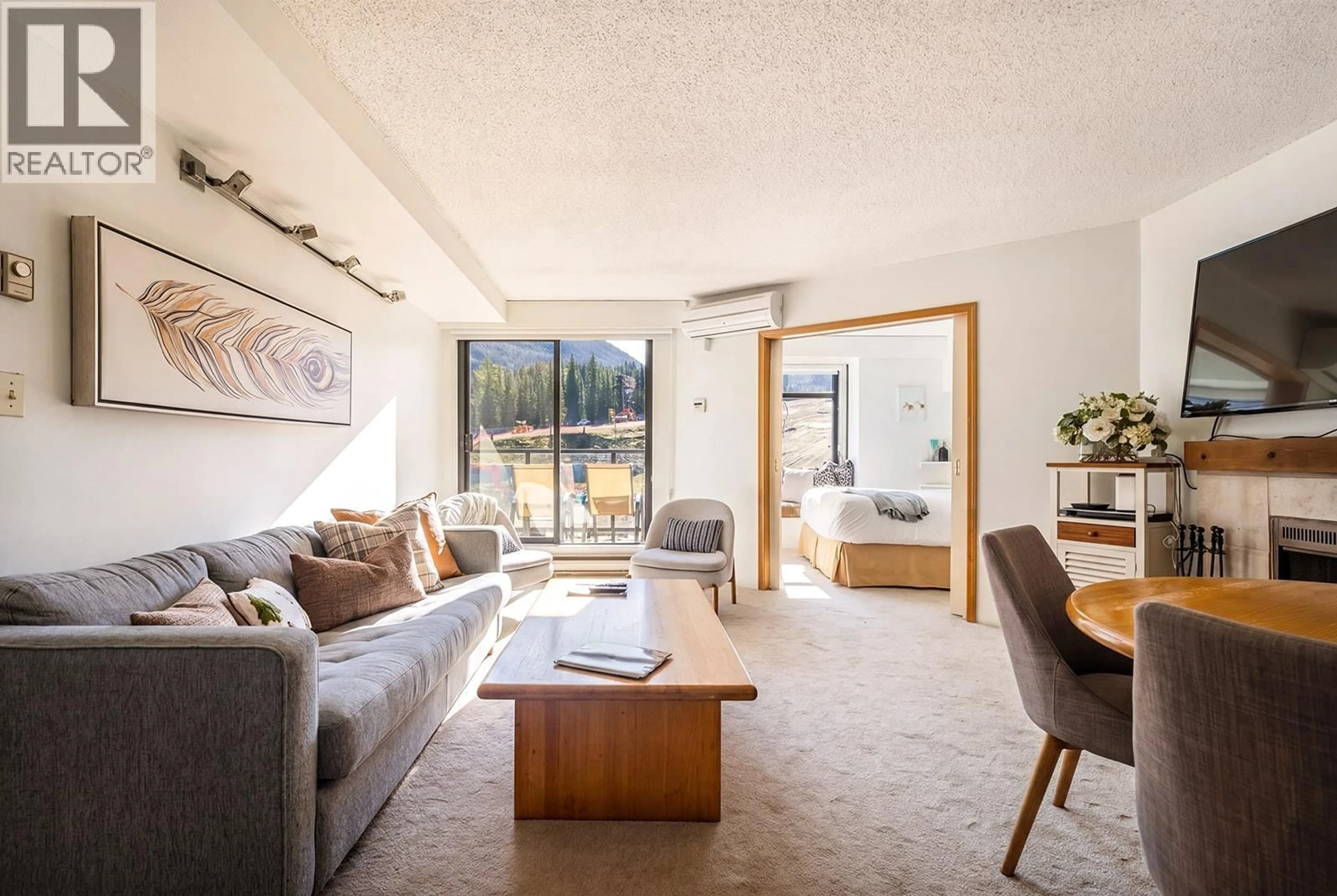 Living room with furniture, unknown for 303 - 4280 MOUNTAIN SQUARE, Whistler British Columbia V8E1B9