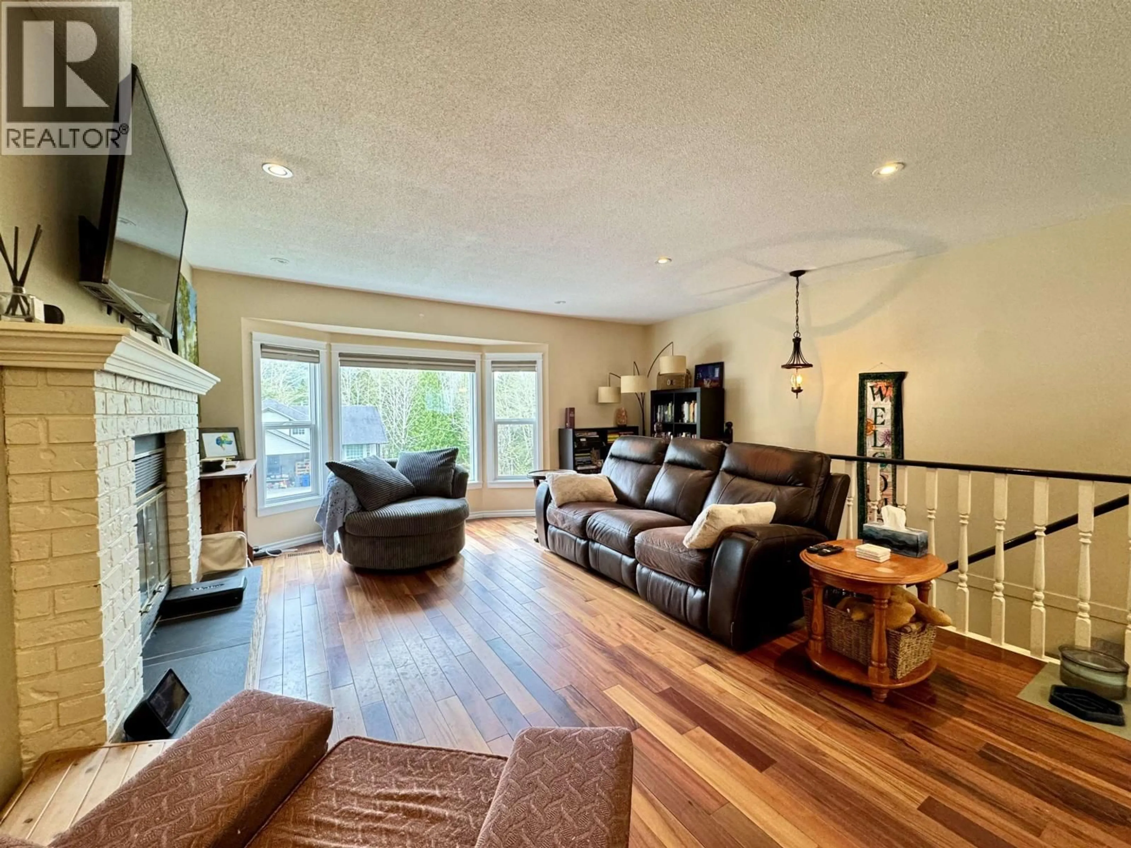 Living room with furniture, wood/laminate floor for 111 MCRAE PLACE, Prince Rupert British Columbia V8J4L5