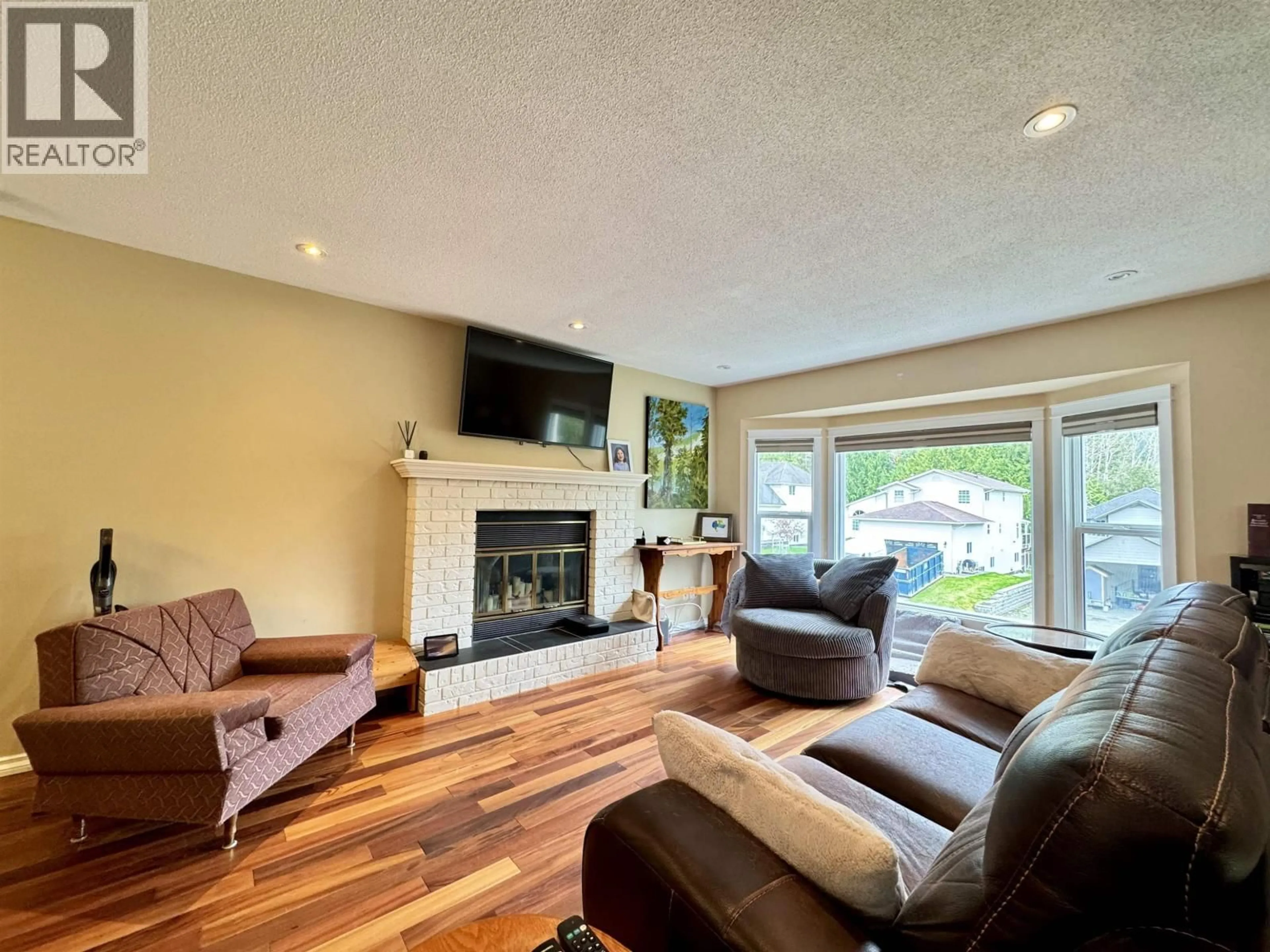 Living room with furniture, wood/laminate floor for 111 MCRAE PLACE, Prince Rupert British Columbia V8J4L5