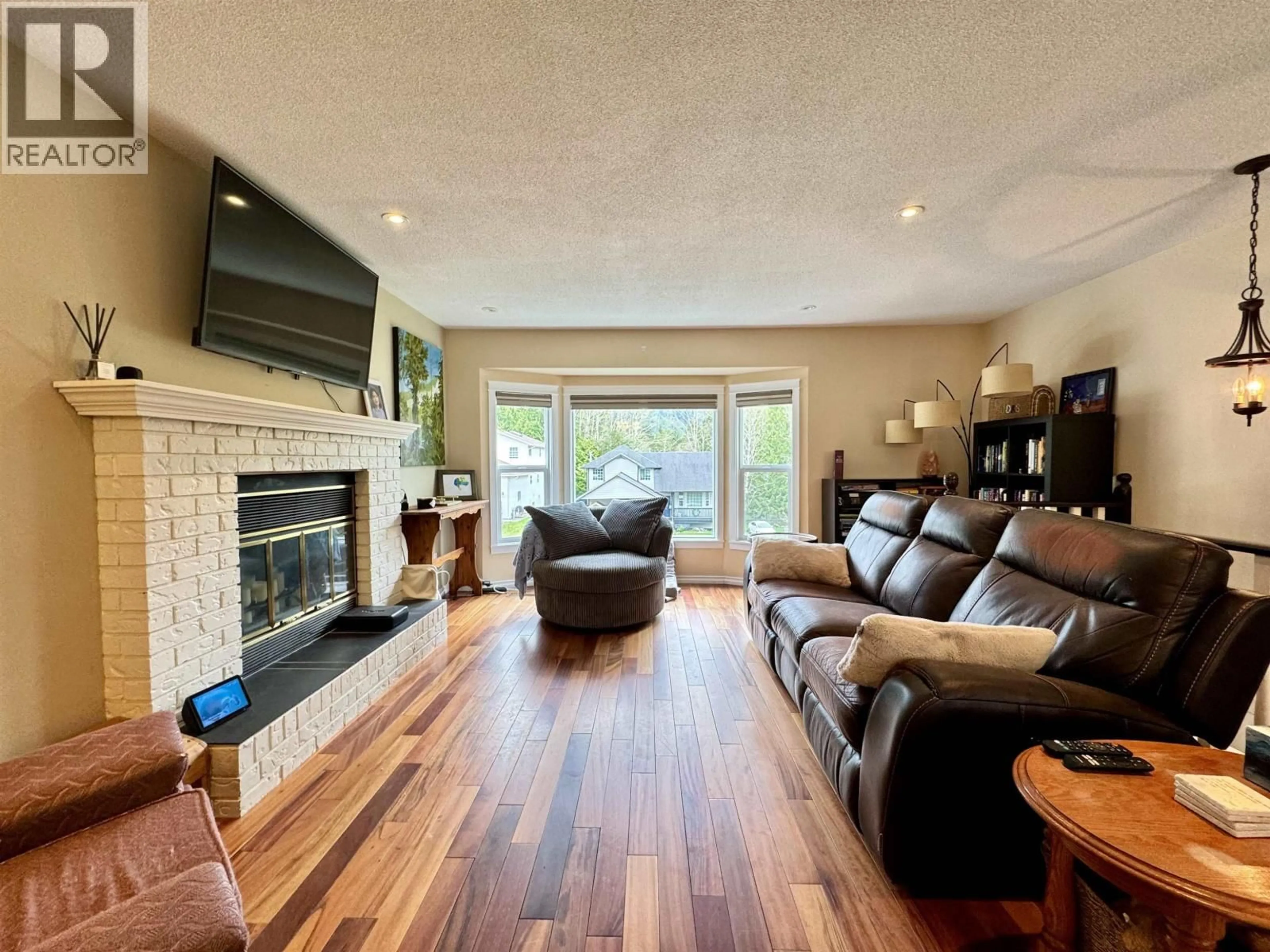 Living room with furniture, wood/laminate floor for 111 MCRAE PLACE, Prince Rupert British Columbia V8J4L5