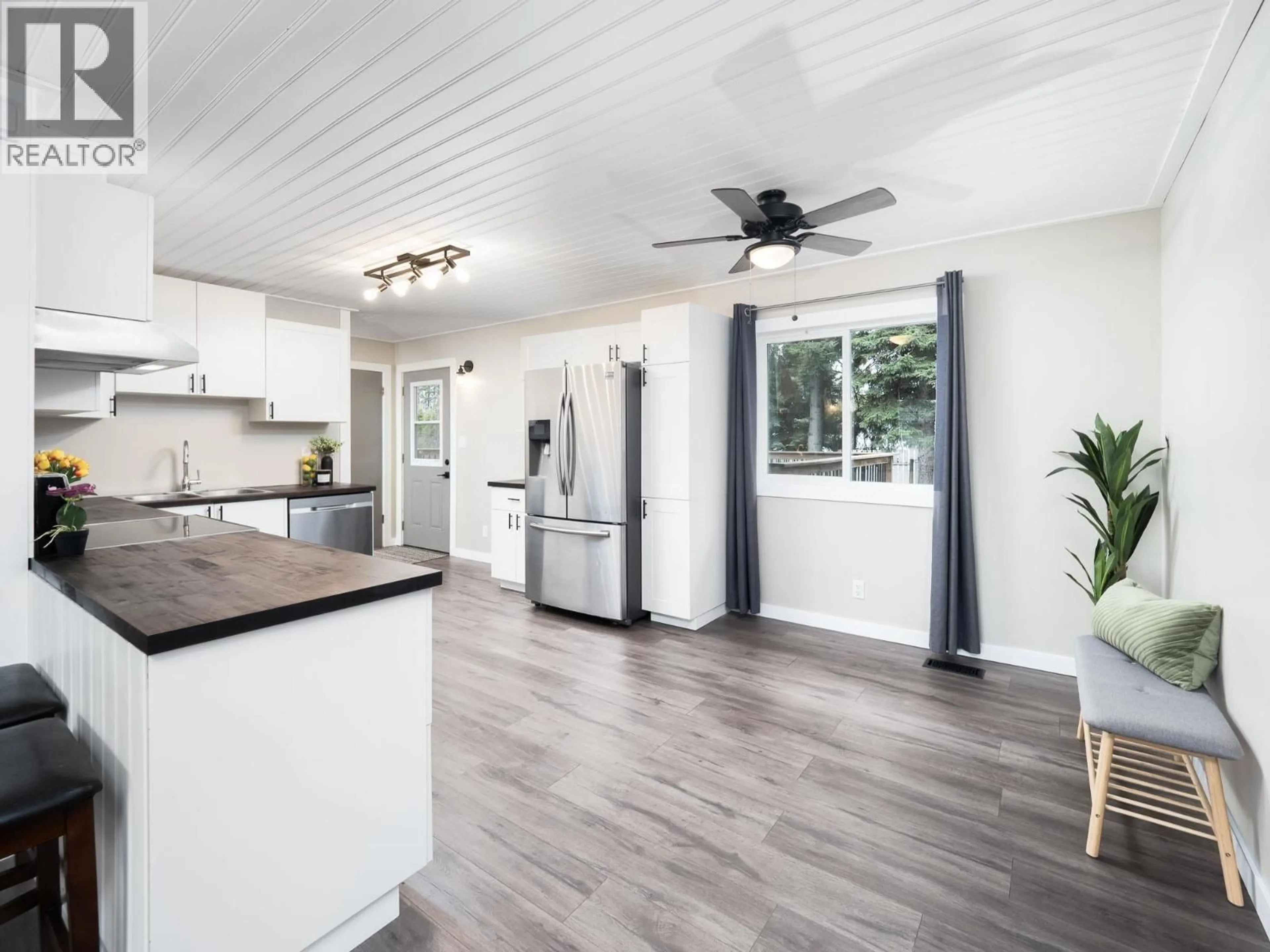 Open concept kitchen, wood/laminate floor for 4141 WEISBROD ROAD, Prince George British Columbia V2K2S6