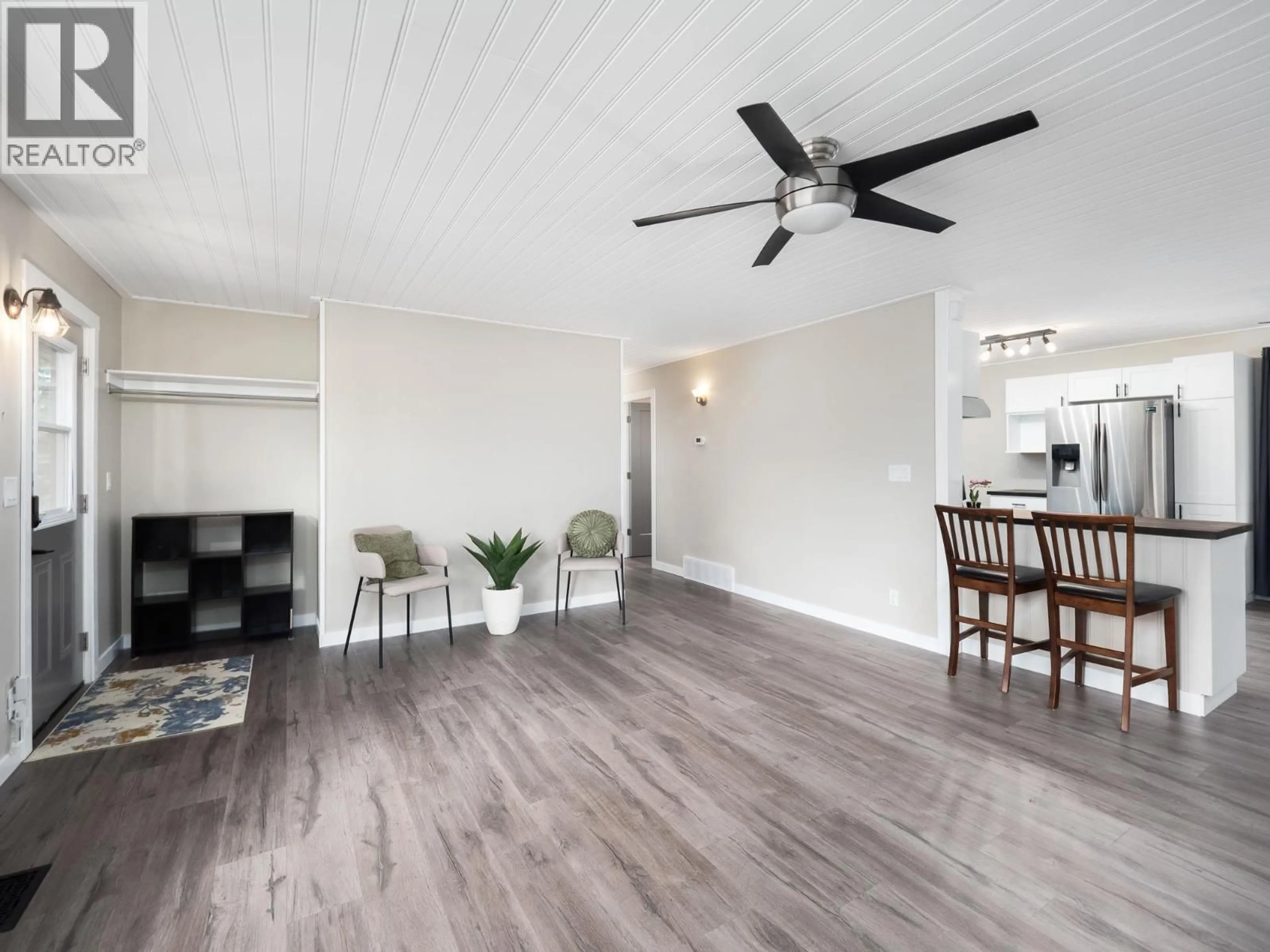 Living room with furniture, wood/laminate floor for 4141 WEISBROD ROAD, Prince George British Columbia V2K2S6