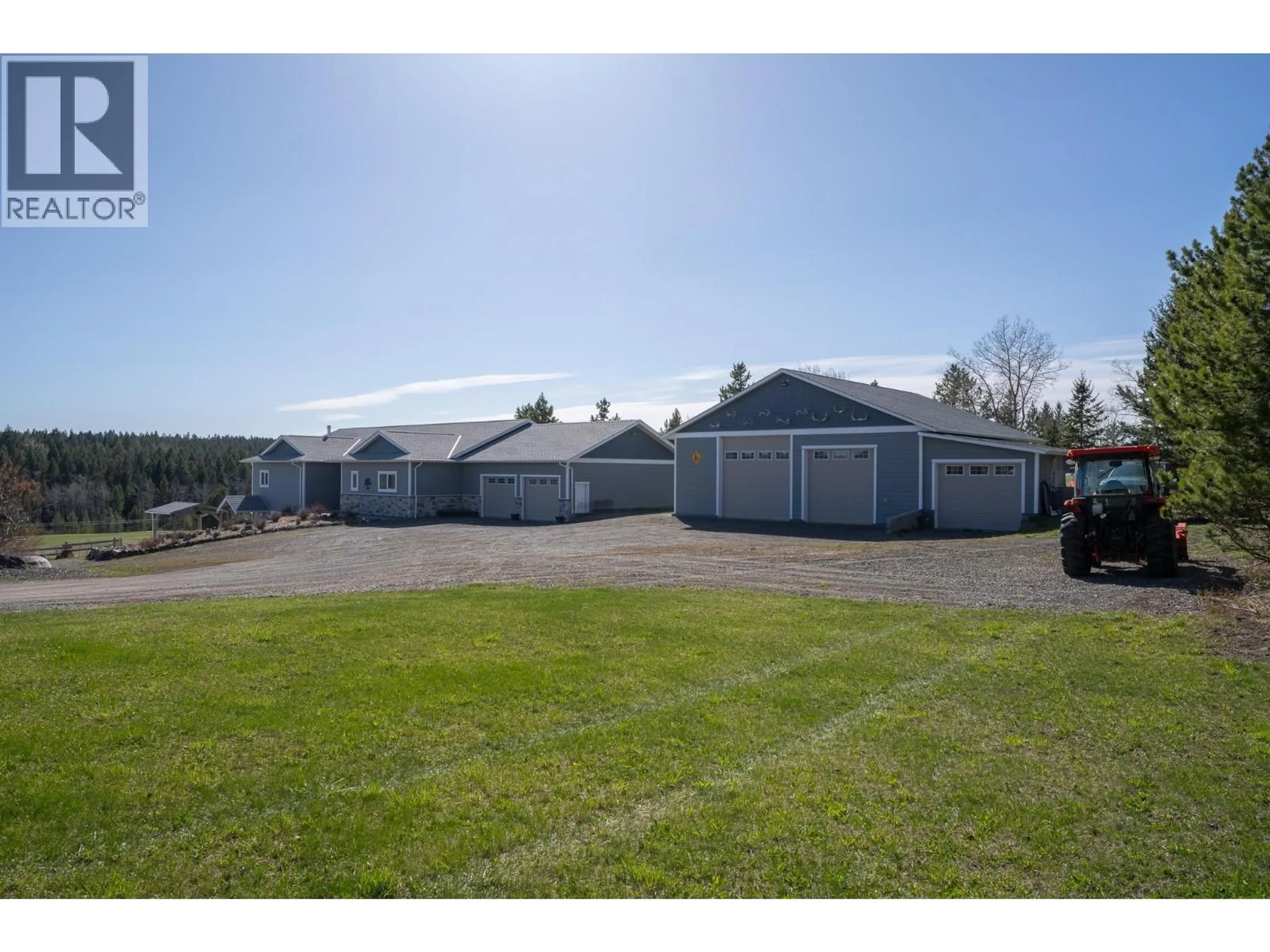 A pic from outside/outdoor area/front of a property/back of a property/a pic from drone, unknown for 4898 TELQUA DRIVE, 108 Mile Ranch British Columbia V0K2Z0