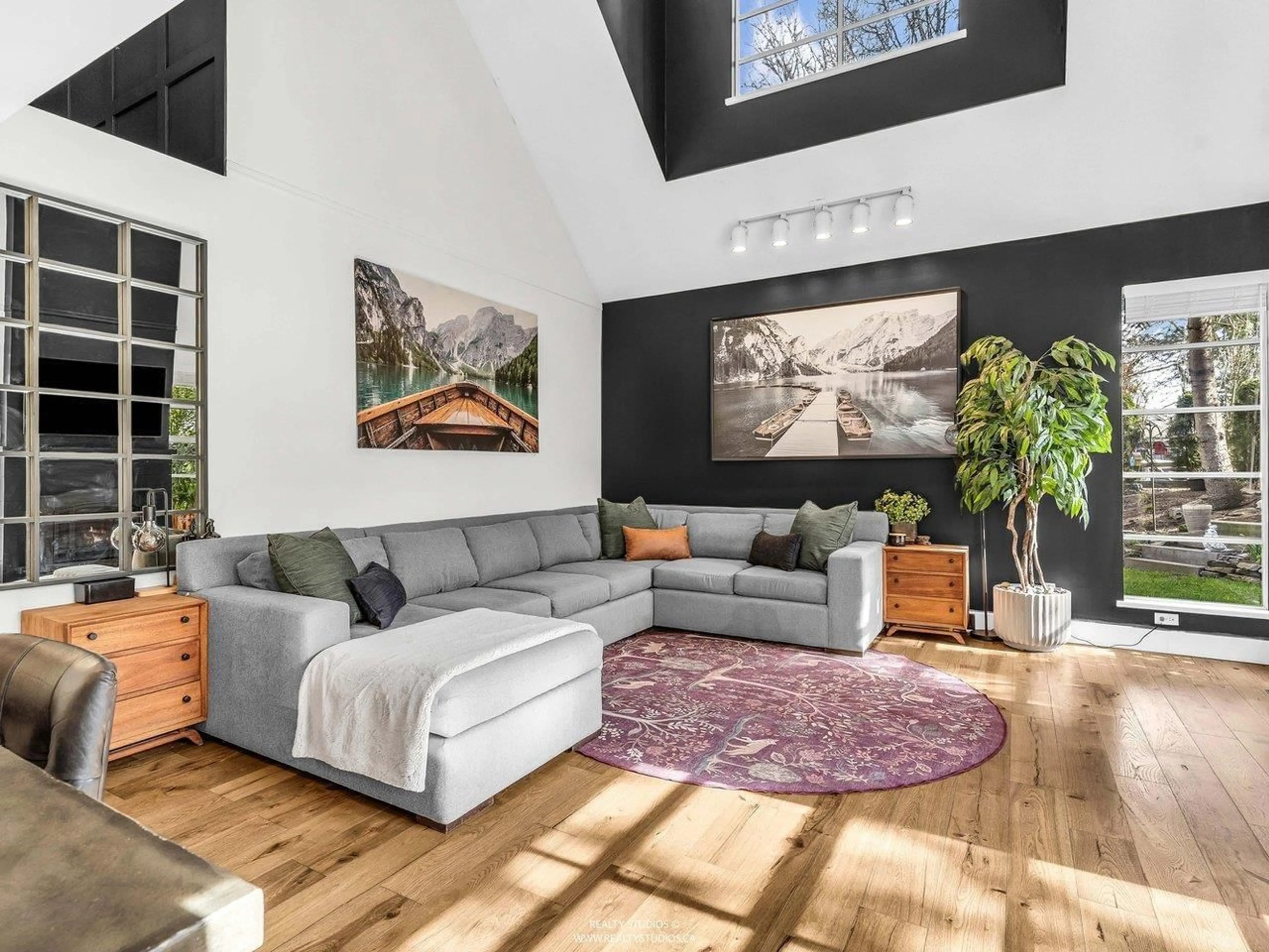 Living room with furniture, wood/laminate floor for 16 - 4847 219 STREET, Langley British Columbia V3A8C1