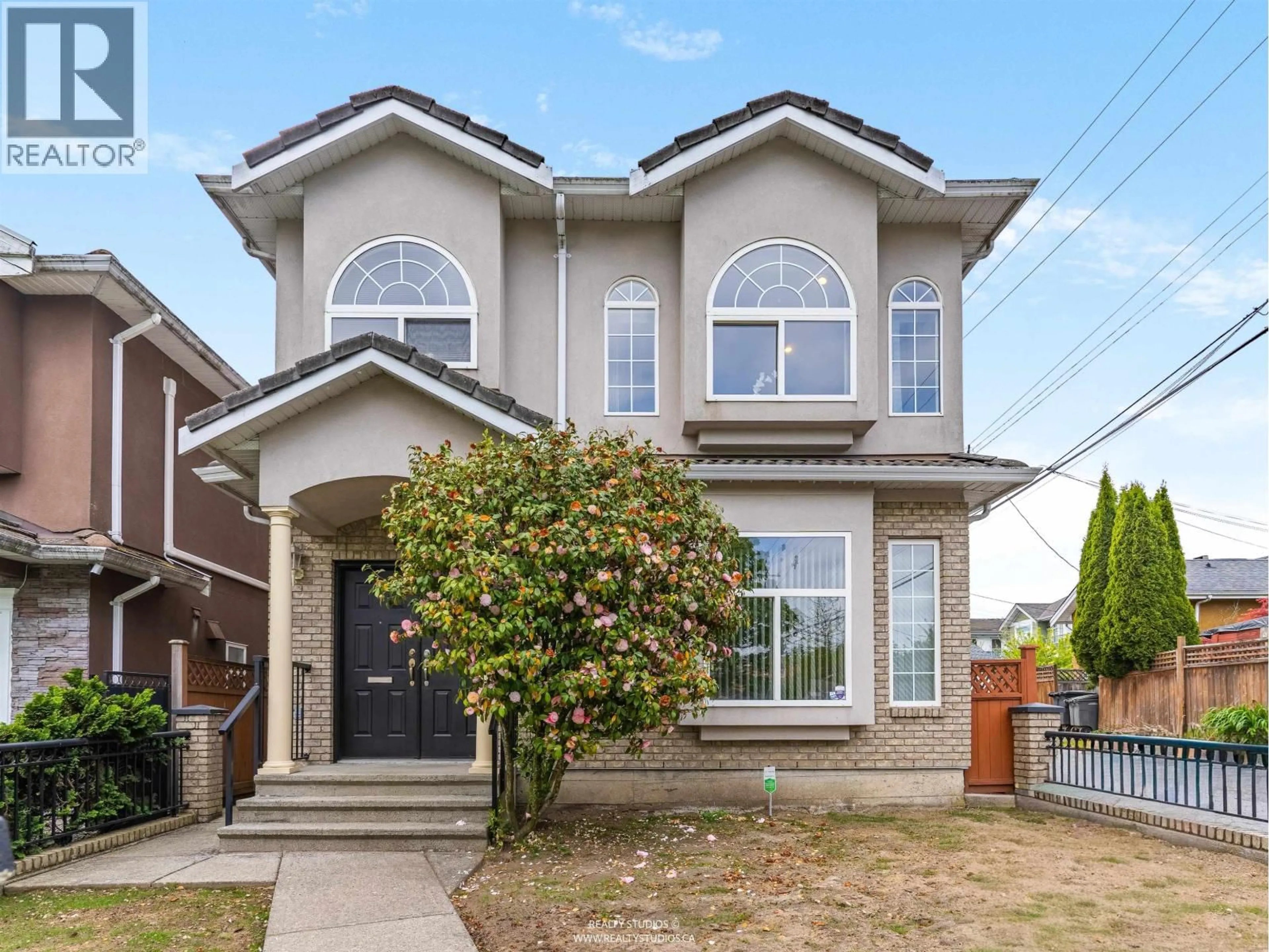 Home with brick exterior material, street for 5323 DUMFRIES STREET, Vancouver British Columbia V5P3A3