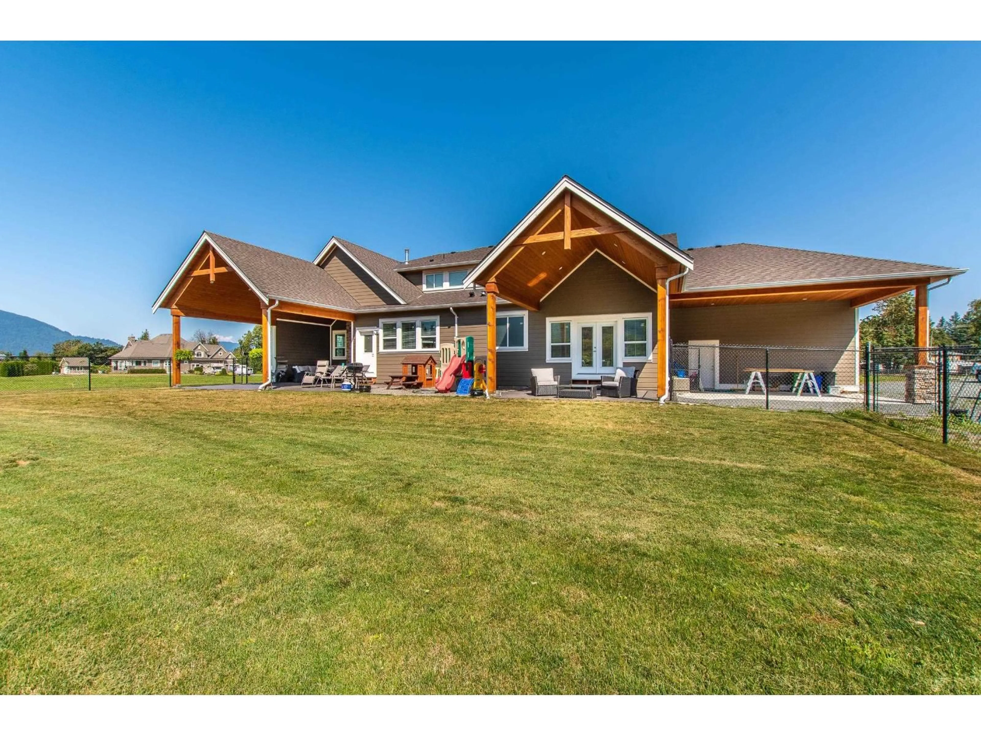 A pic from outside/outdoor area/front of a property/back of a property/a pic from drone, unknown for 43832 KEITH WILSON ROAD, Chilliwack British Columbia V2R4B5