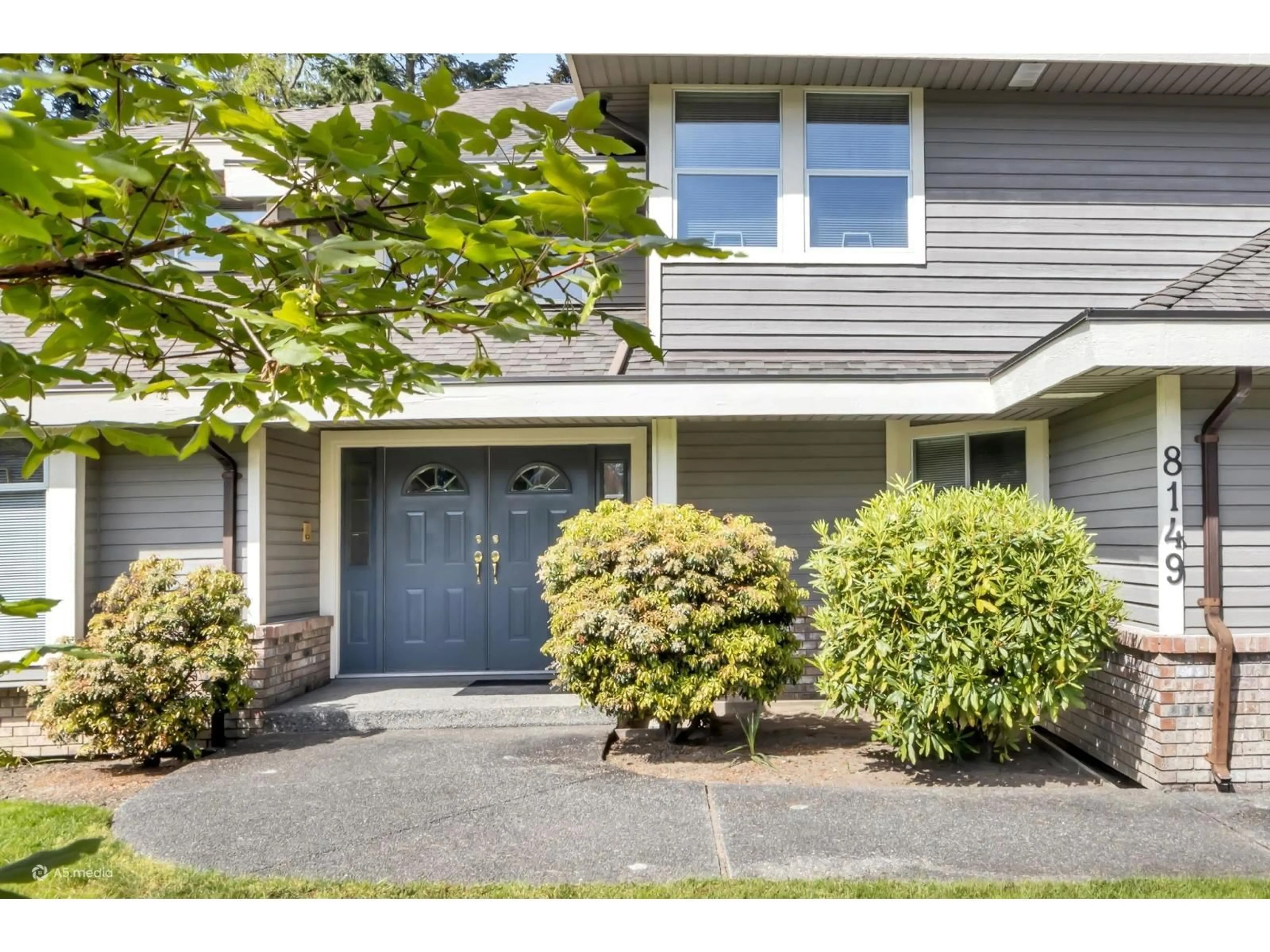 Home with vinyl exterior material, street for 8149 149 STREET, Surrey British Columbia V3S7H4