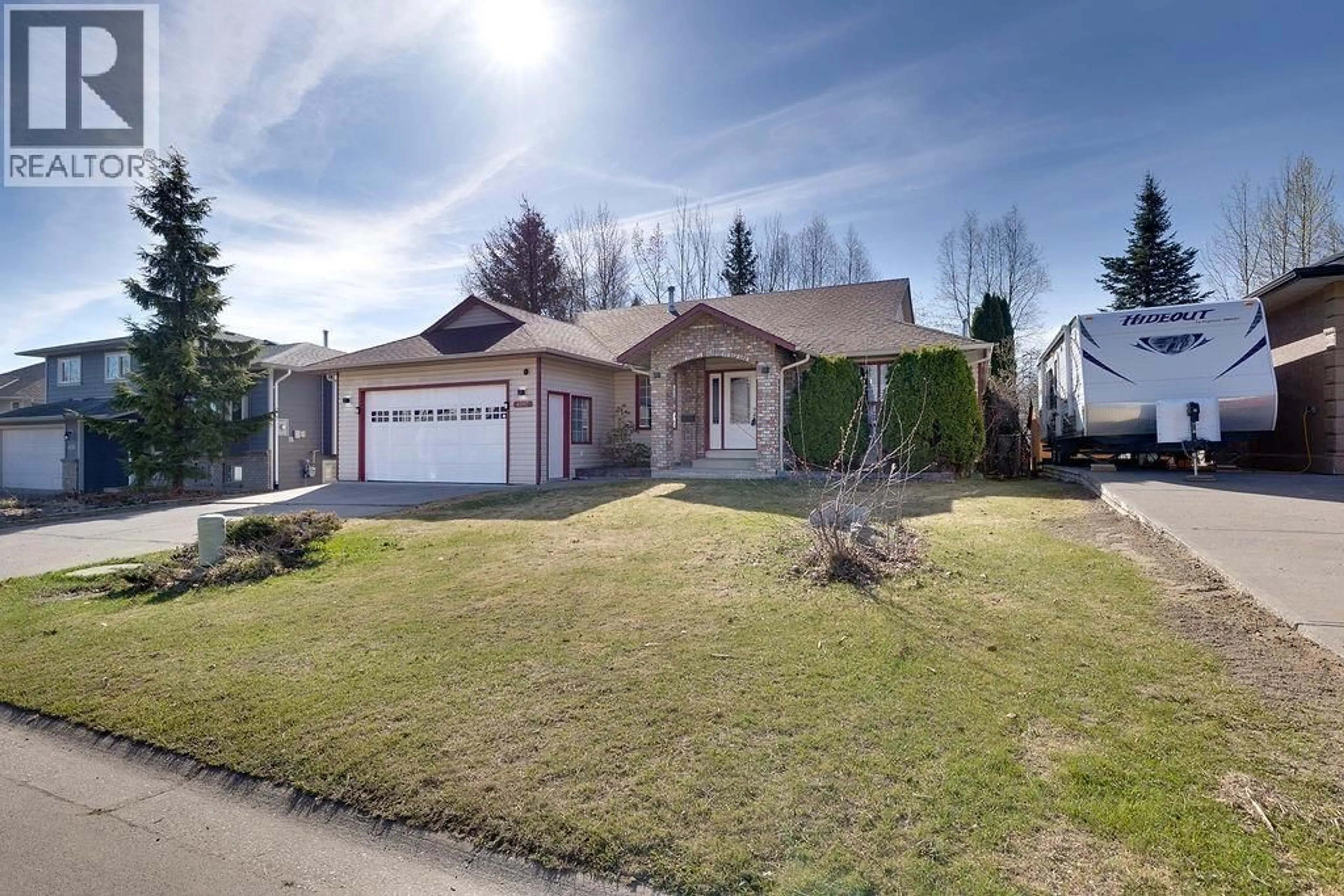 Home with vinyl exterior material, street for 4597 RAINER CRESCENT, Prince George British Columbia V2K4X1