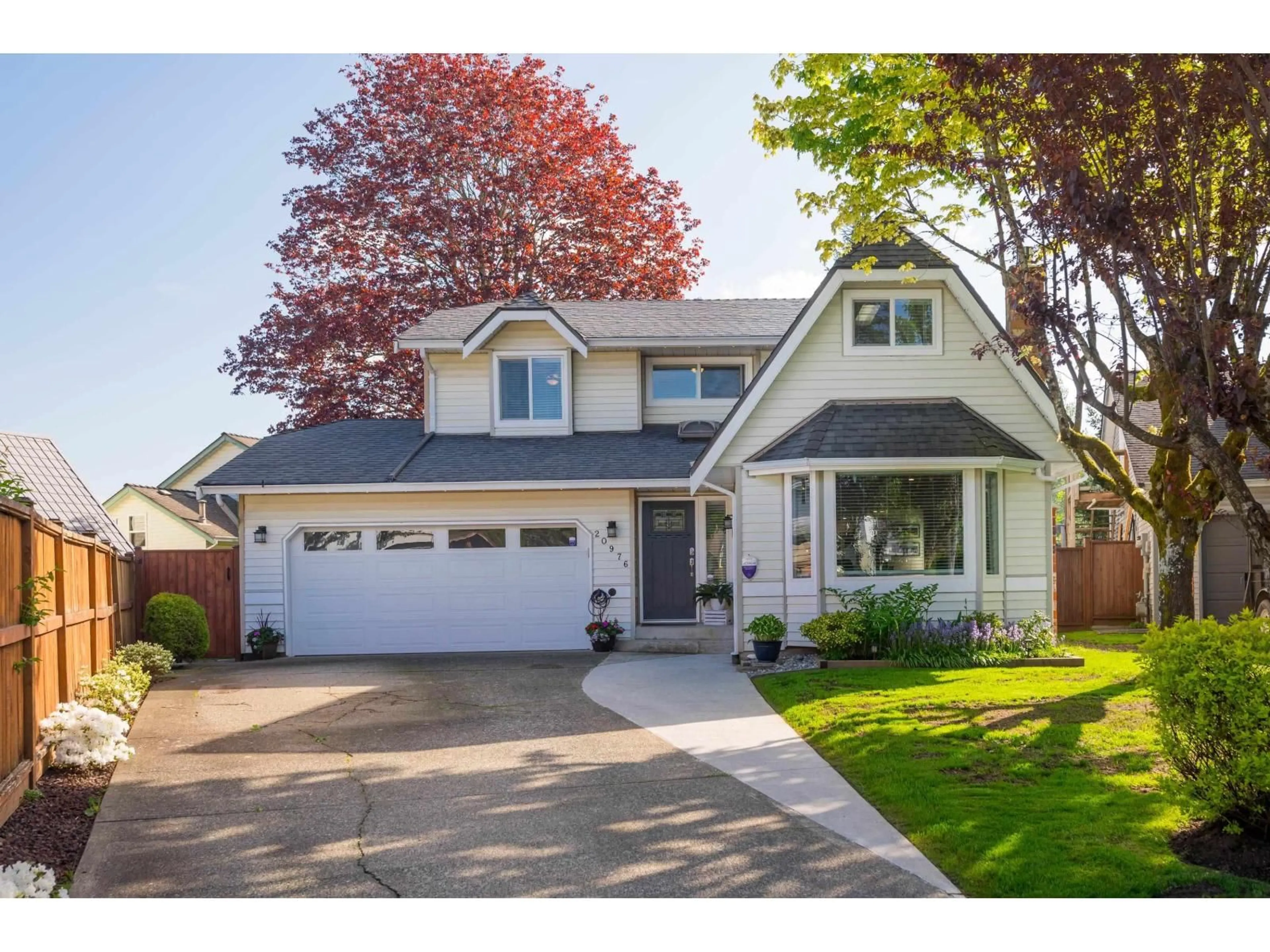 Home with vinyl exterior material, street for 20976 93B PLACE, Langley British Columbia V1M1S2