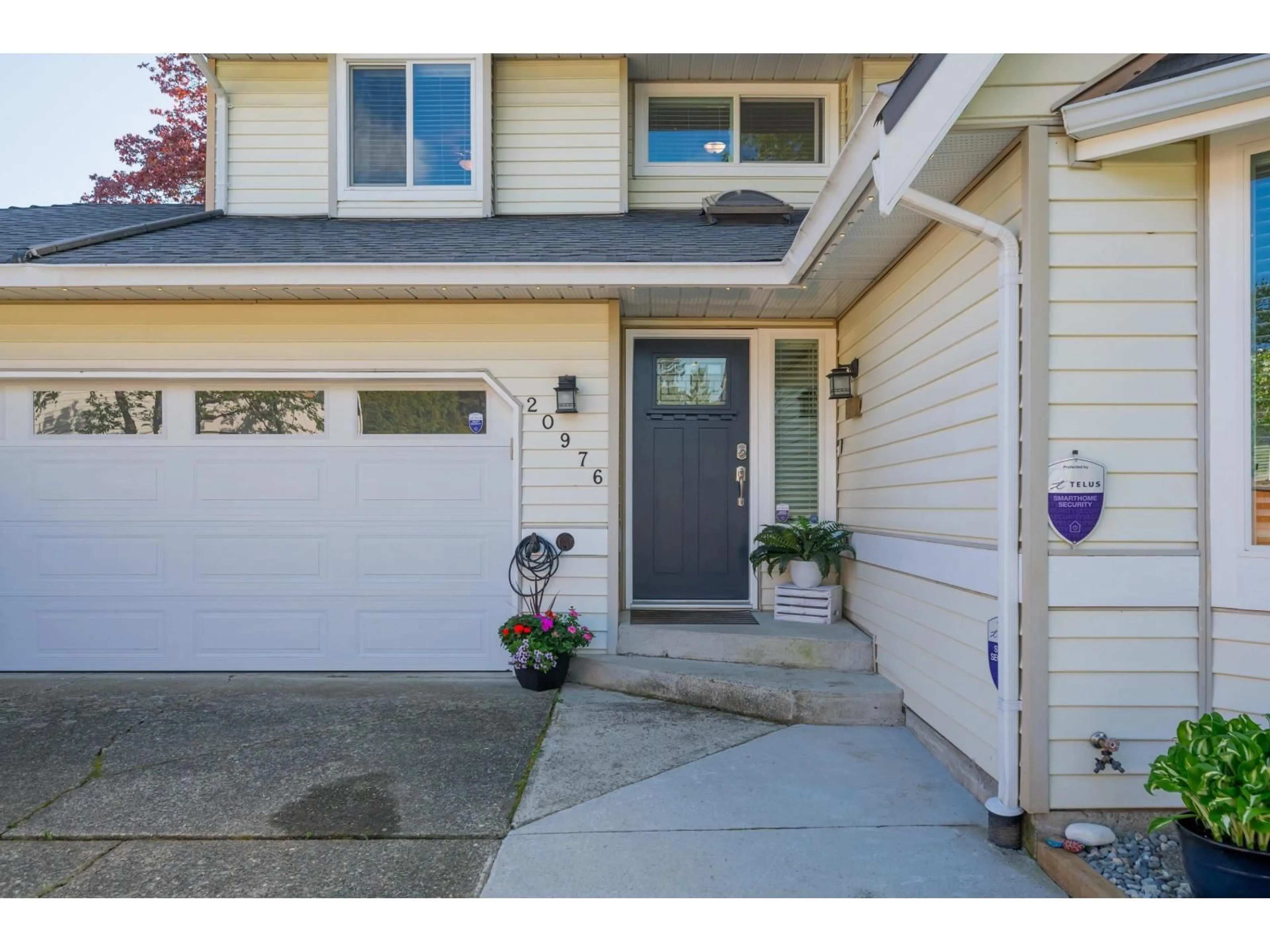 Home with vinyl exterior material, street for 20976 93B PLACE, Langley British Columbia V1M1S2