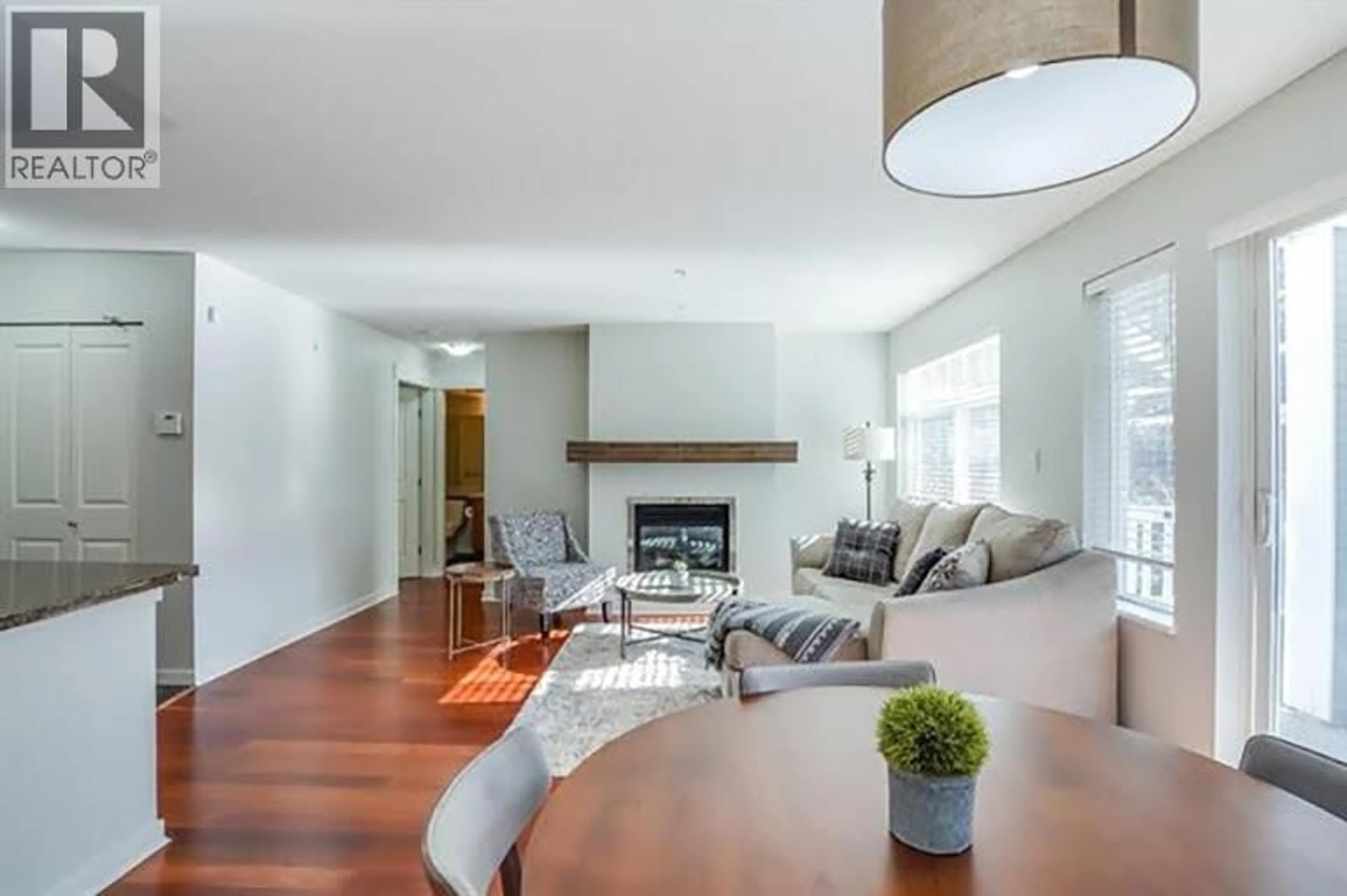 Living room with furniture, wood/laminate floor for 204 - 1706 56 STREET, Delta British Columbia V4L2R3