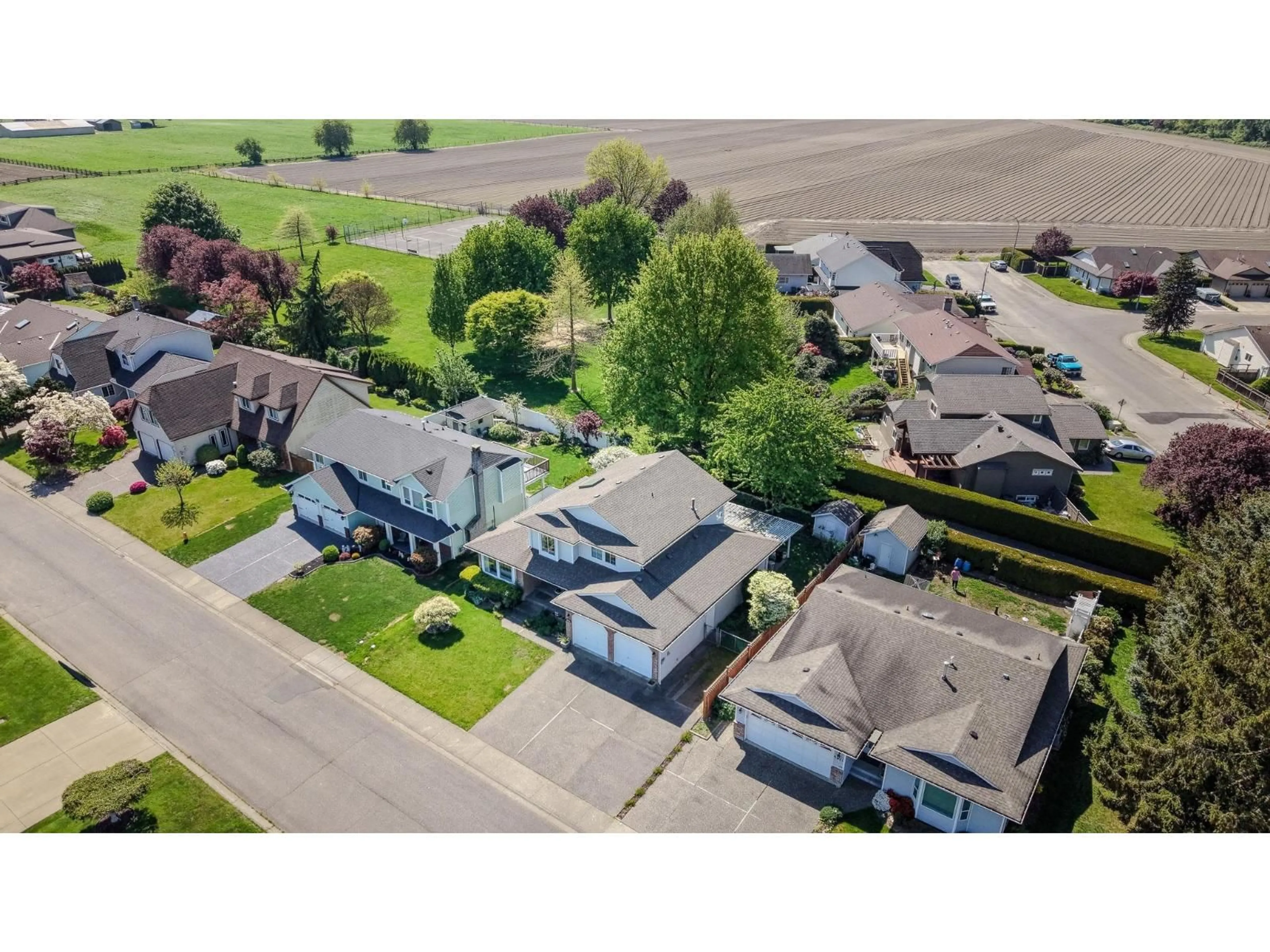 A pic from outside/outdoor area/front of a property/back of a property/a pic from drone, street for 6915 COACH LAMP DRIVE, Chilliwack British Columbia V2R2V4