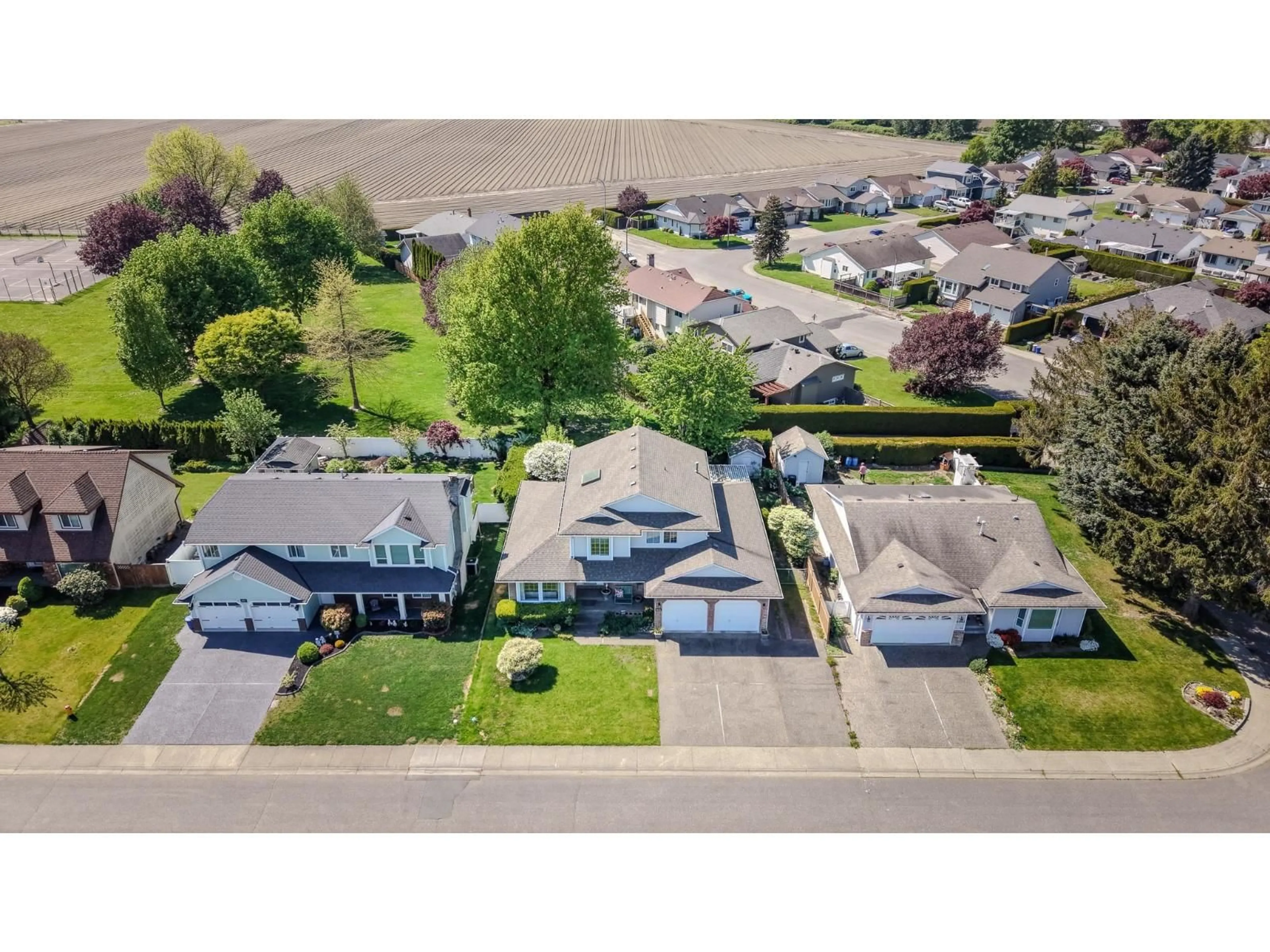 A pic from outside/outdoor area/front of a property/back of a property/a pic from drone, street for 6915 COACH LAMP DRIVE, Chilliwack British Columbia V2R2V4