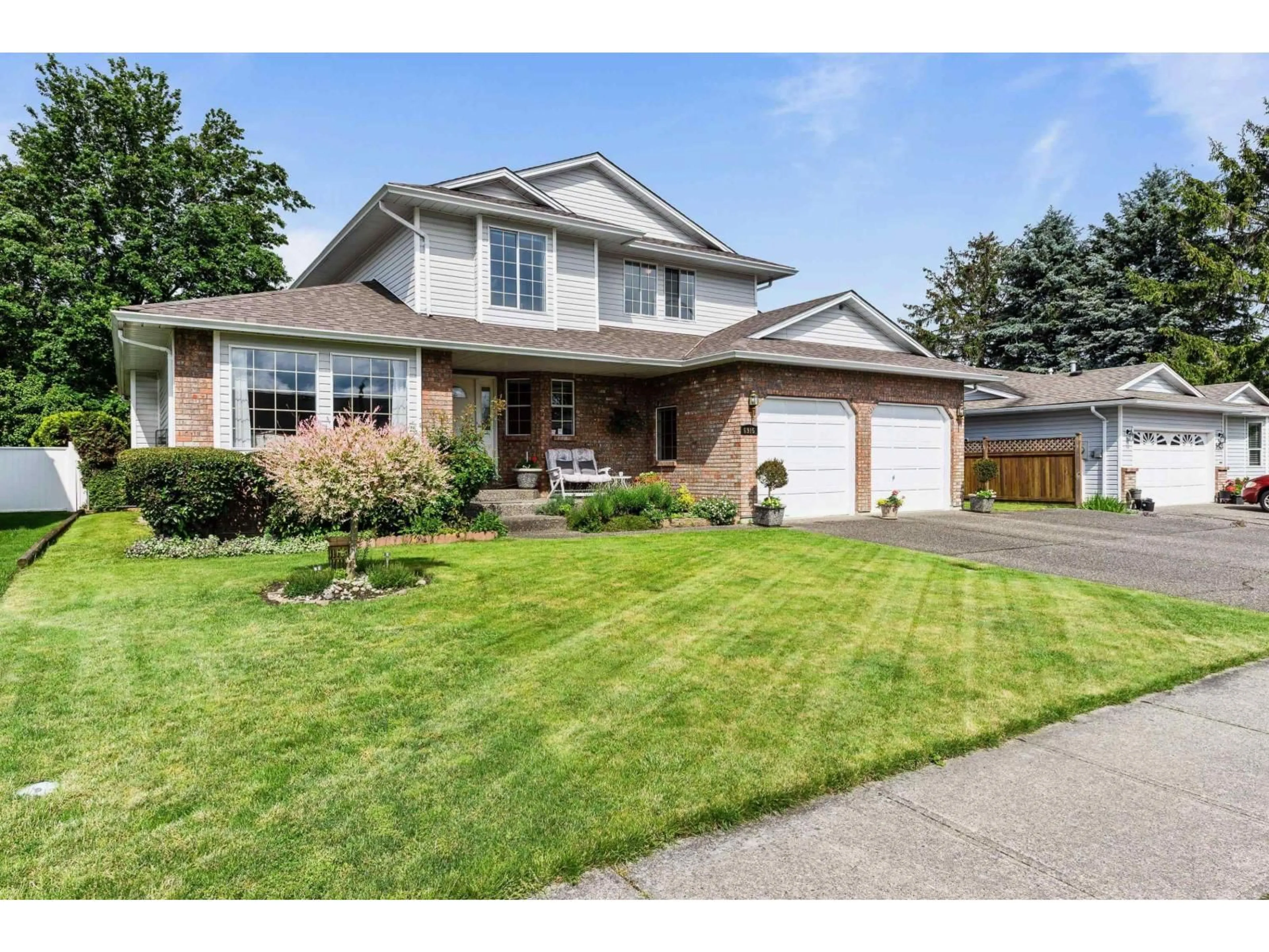 Home with vinyl exterior material, street for 6915 COACH LAMP DRIVE, Chilliwack British Columbia V2R2V4