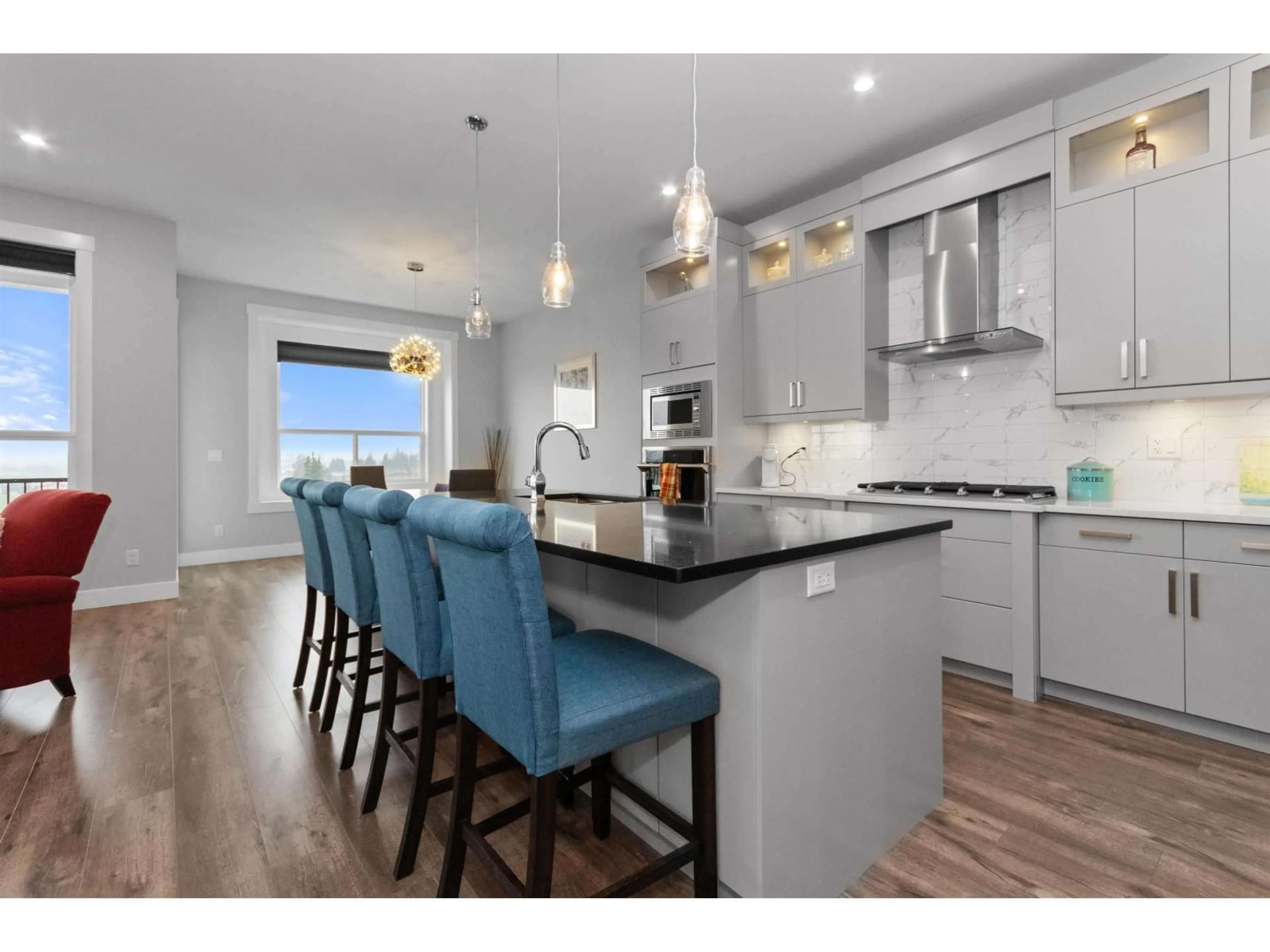 Open concept kitchen, wood/laminate floor for 45 - 50778 LEDGESTONE PLACE, Chilliwack British Columbia V2P0E7