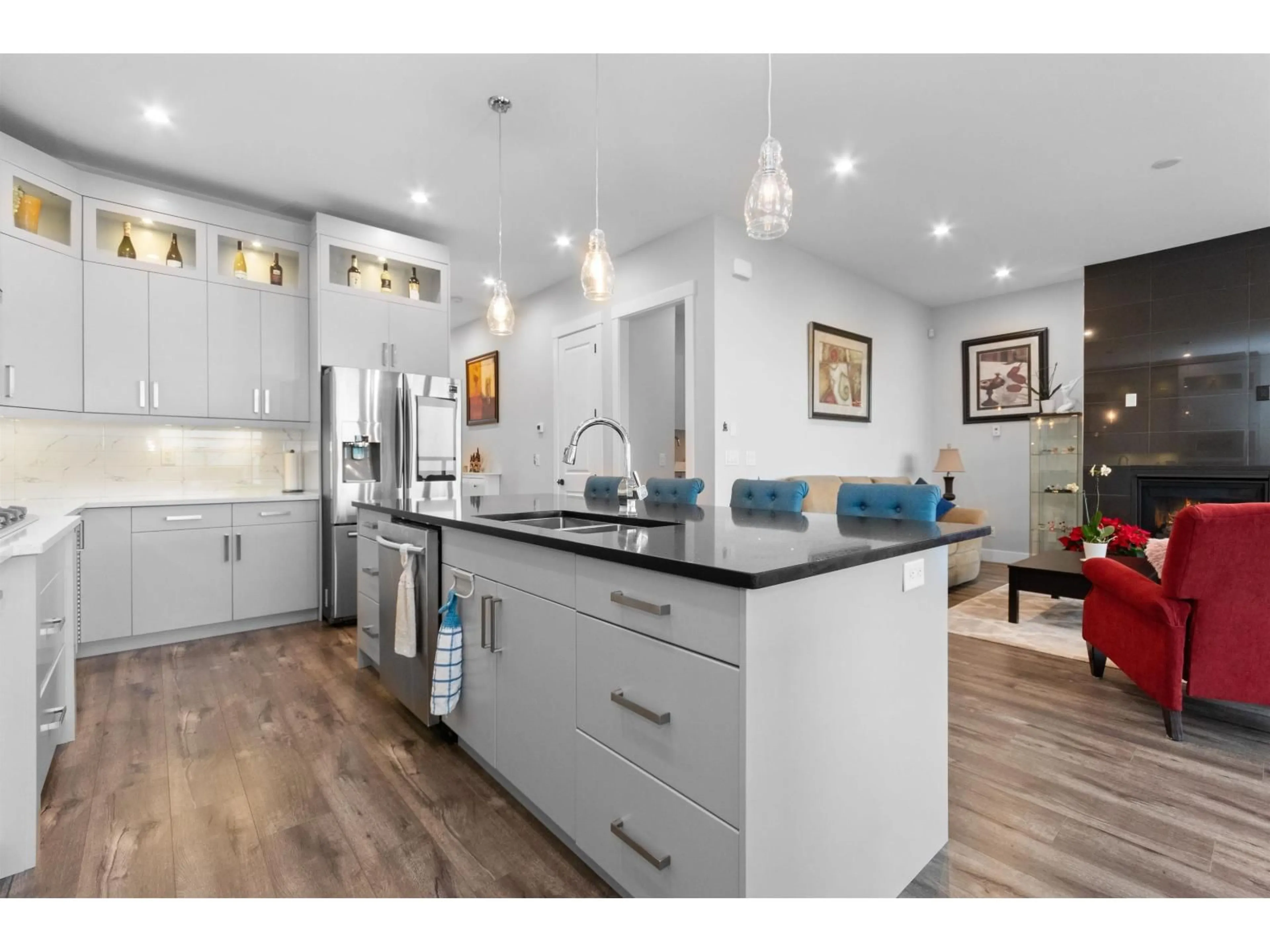 Open concept kitchen, wood/laminate floor for 45 - 50778 LEDGESTONE PLACE, Chilliwack British Columbia V2P0E7