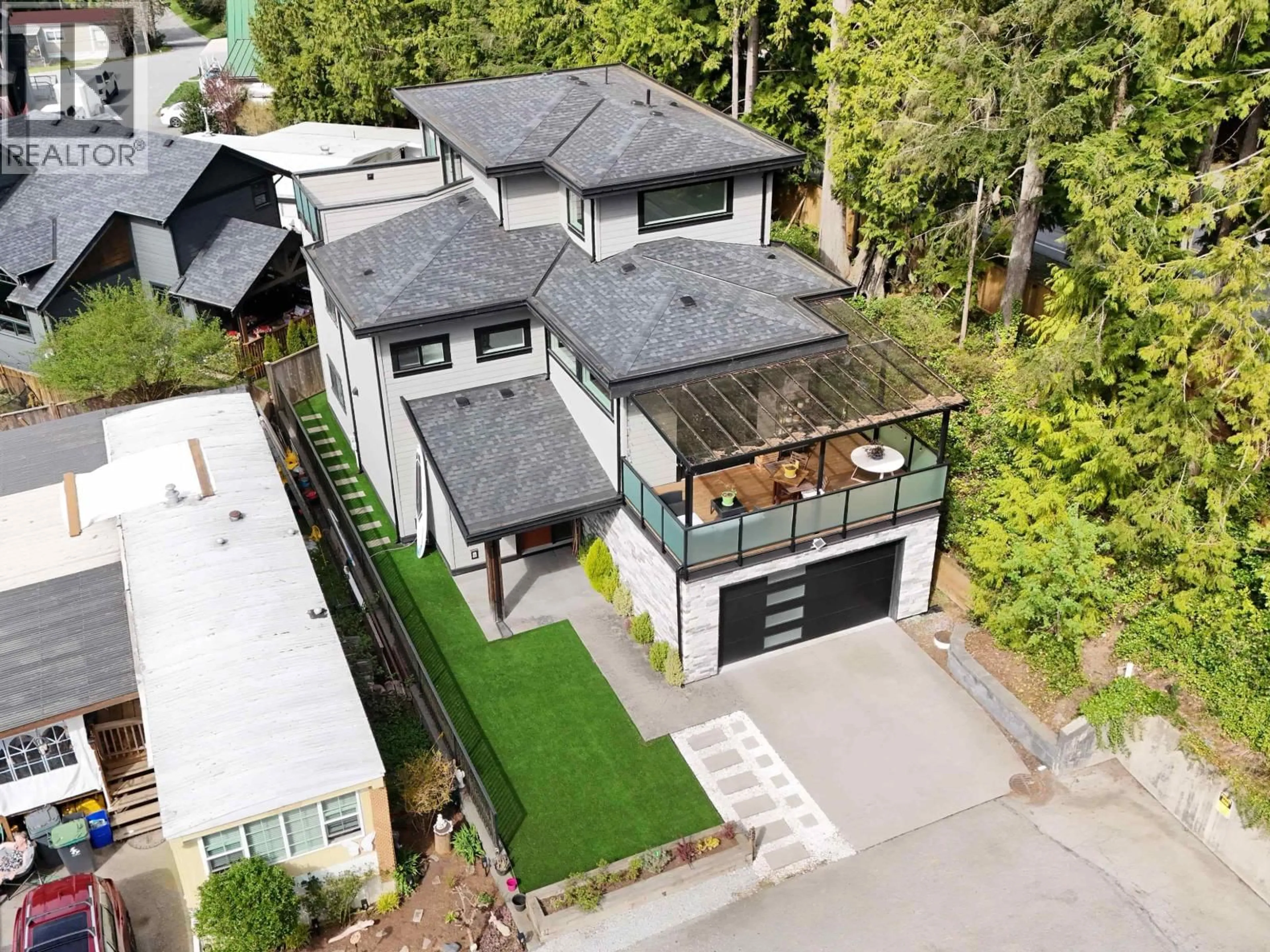 A pic from outside/outdoor area/front of a property/back of a property/a pic from drone, street for 52 - 3295 SUNNYSIDE ROAD, Anmore British Columbia V3H4Z4