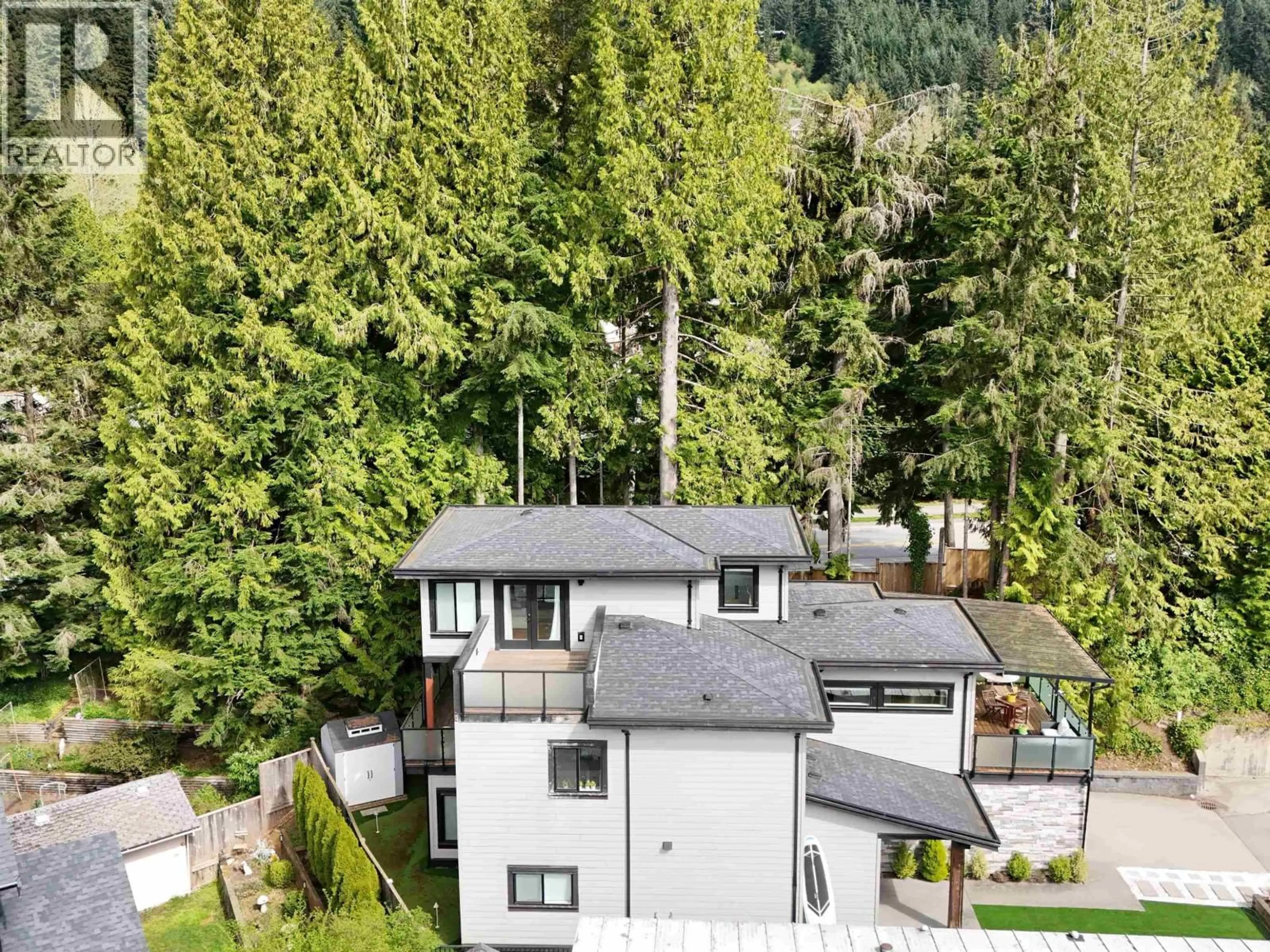A pic from outside/outdoor area/front of a property/back of a property/a pic from drone, forest/trees view for 52 - 3295 SUNNYSIDE ROAD, Anmore British Columbia V3H4Z4
