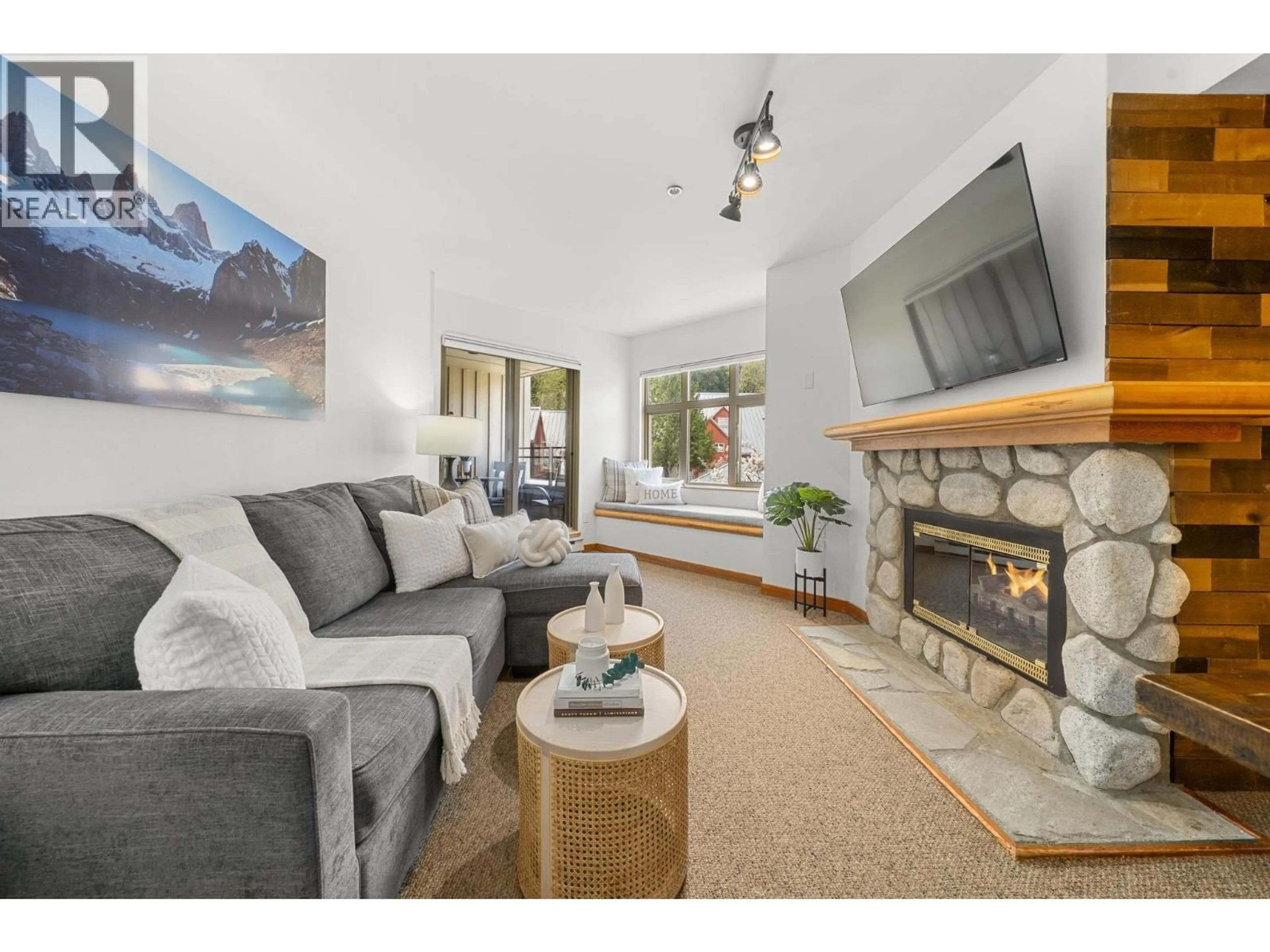 Living room with furniture, unknown for 204 - 2050 LAKE PLACID ROAD, Whistler British Columbia V0N1B2