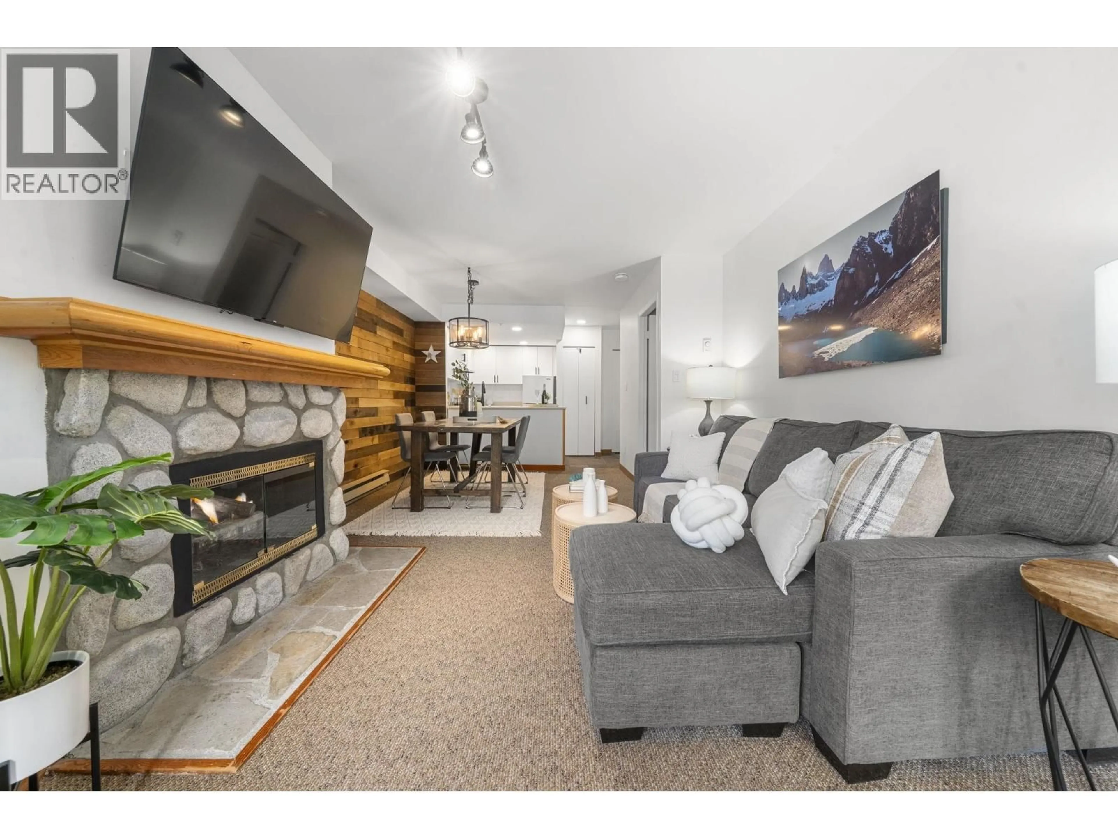 Living room with furniture, unknown for 204 - 2050 LAKE PLACID ROAD, Whistler British Columbia V0N1B2