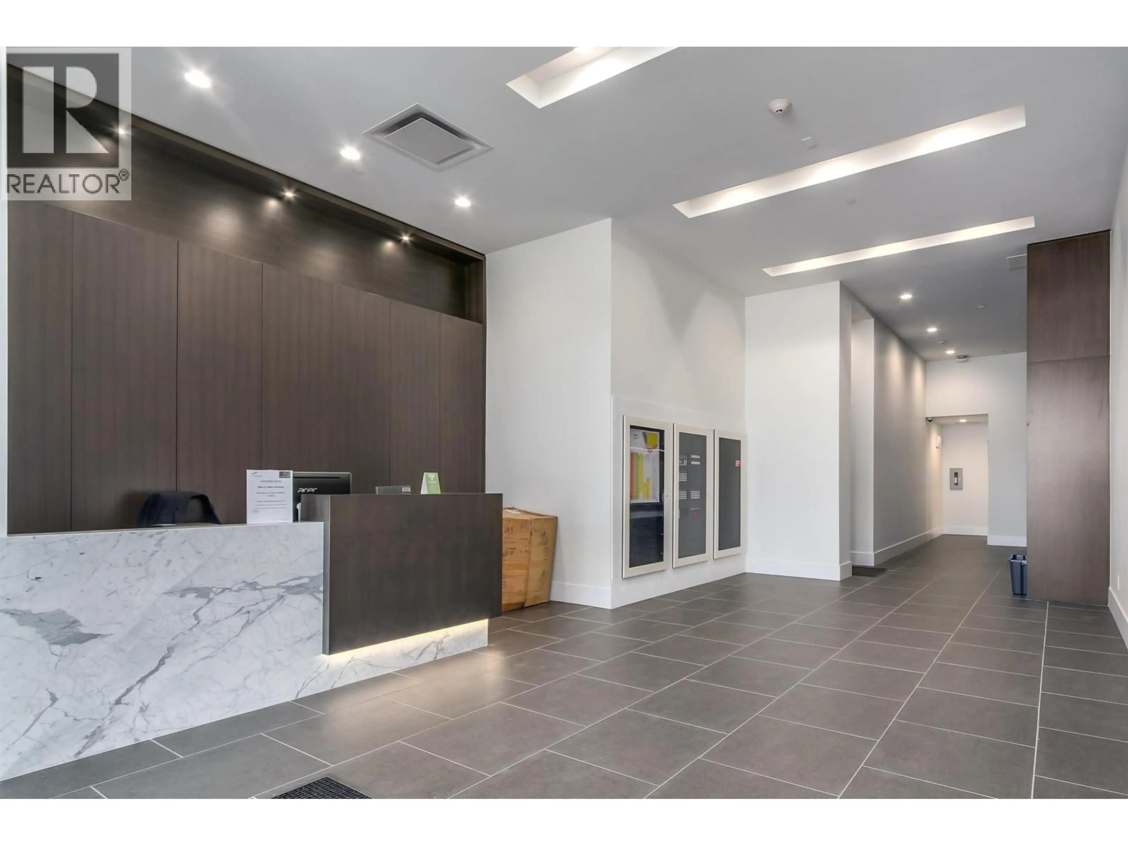 Indoor foyer for 601 - 7468 LANSDOWNE ROAD, Richmond British Columbia V7C0B7