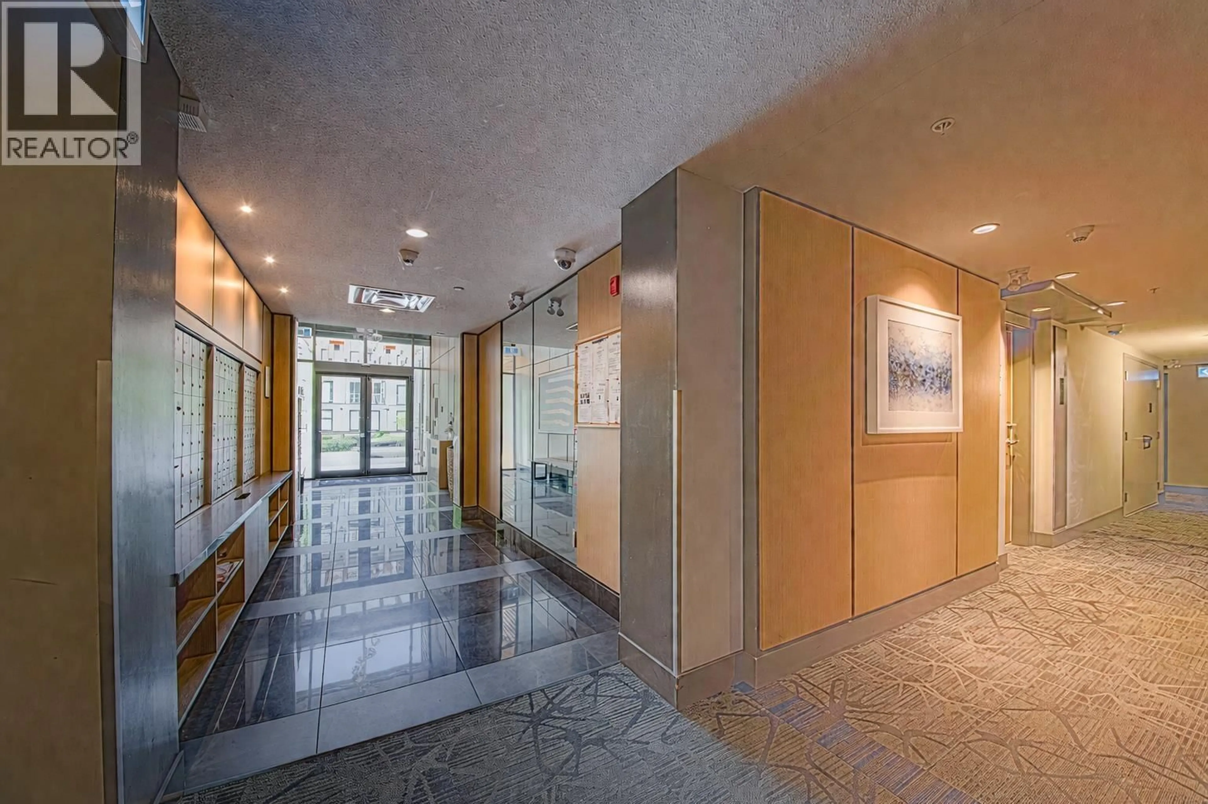 Indoor foyer for 313 - 9877 UNIVERSITY CRESCENT, Burnaby British Columbia V5A0E5