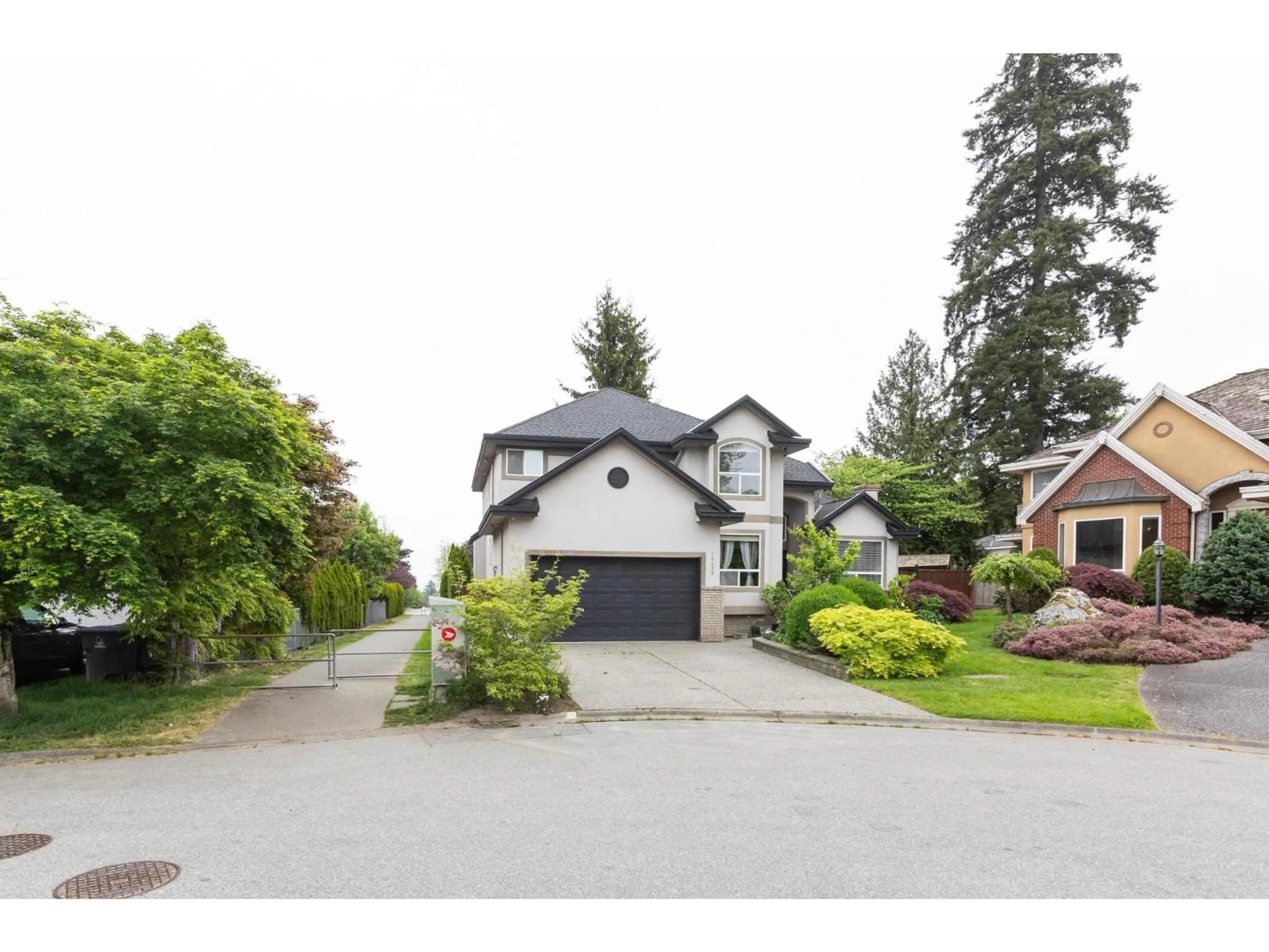 Home with vinyl exterior material, street for 10438 168A STREET, Surrey British Columbia V4N5A8