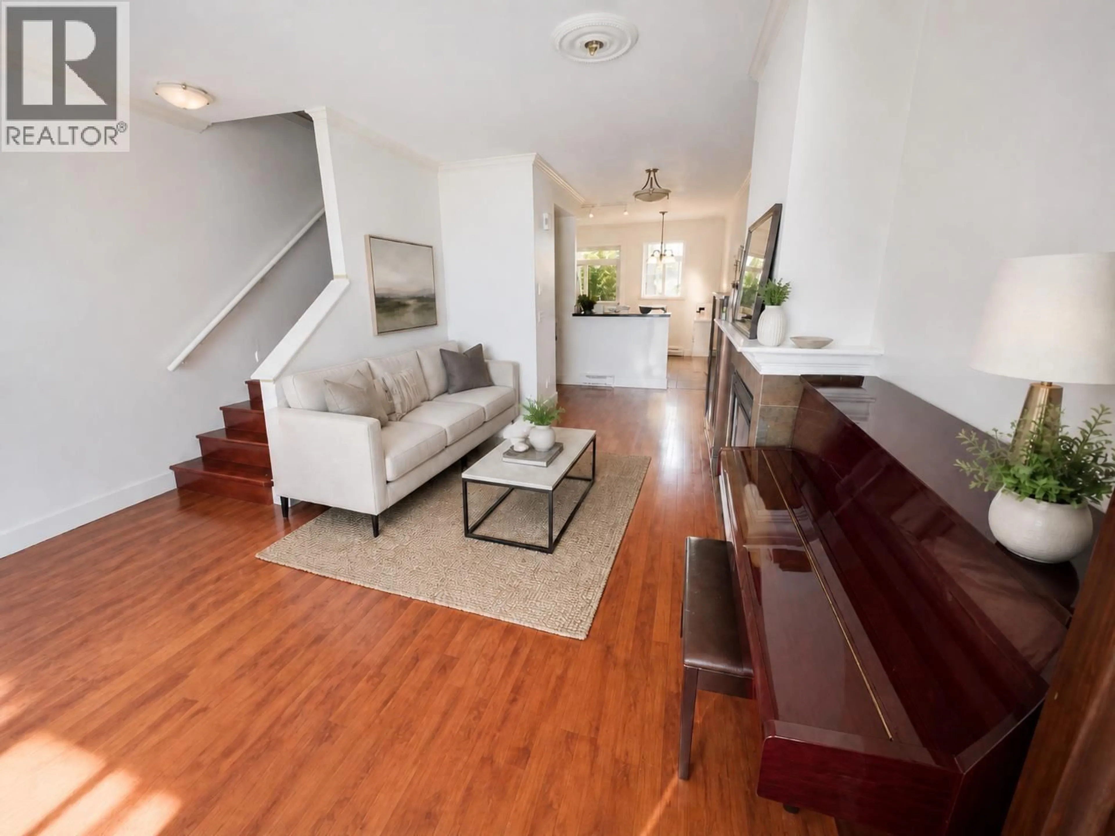 Living room with furniture, wood/laminate floor for 52 - 6300 LONDON ROAD, Richmond British Columbia V7E6V6
