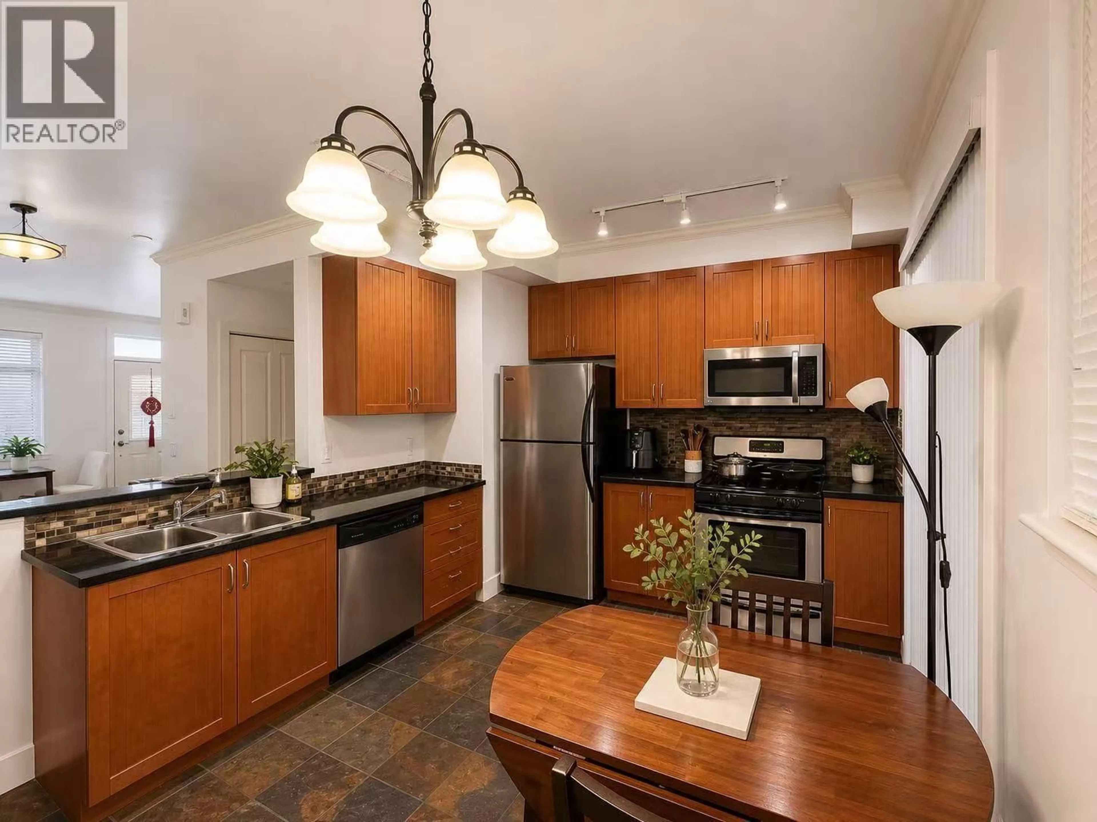 Open concept kitchen, ceramic/tile floor for 52 - 6300 LONDON ROAD, Richmond British Columbia V7E6V6