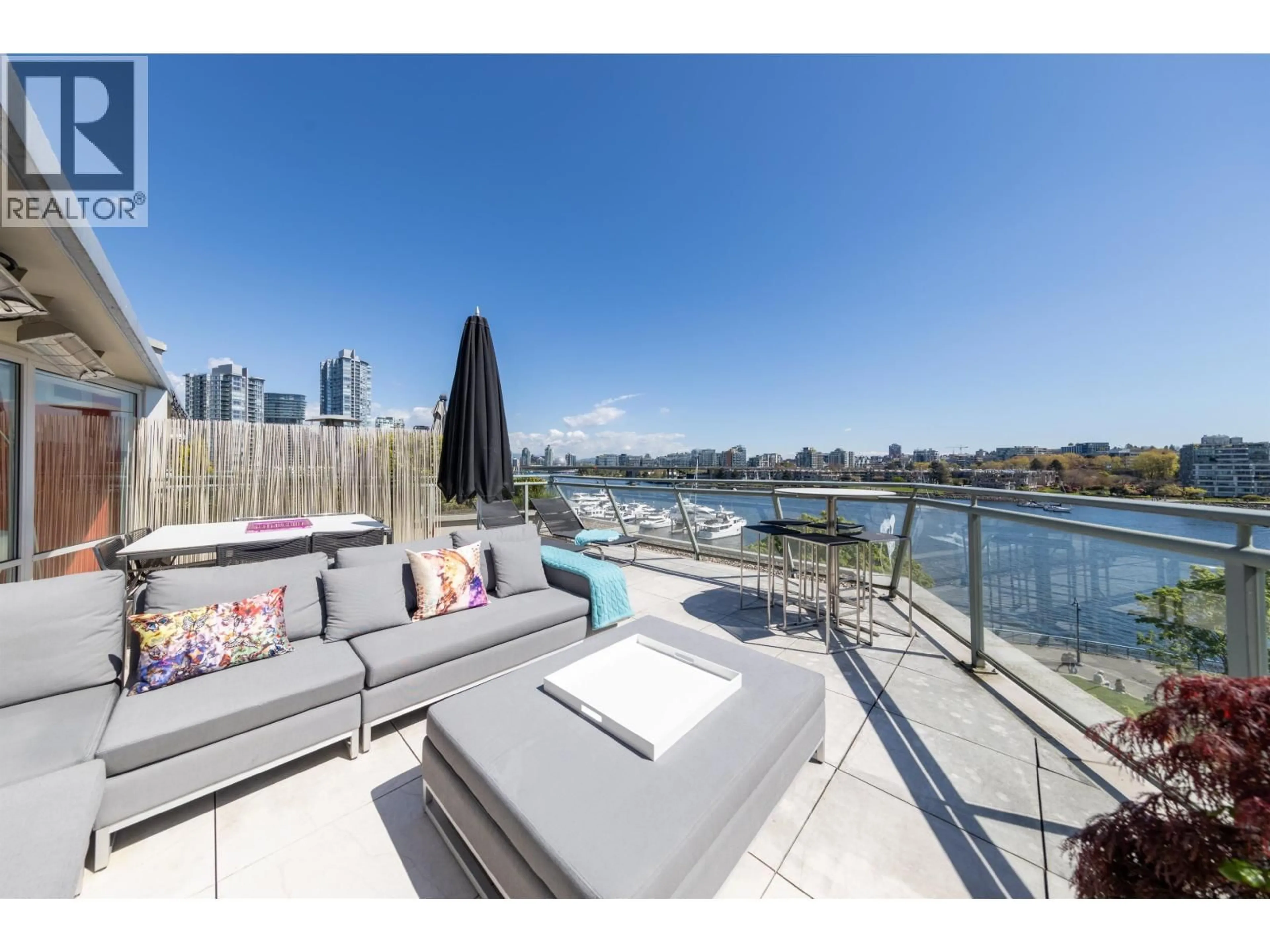 Patio, water/lake/river/ocean view for 606 - 1288 MARINASIDE CRESCENT, Vancouver British Columbia V6Z2W5