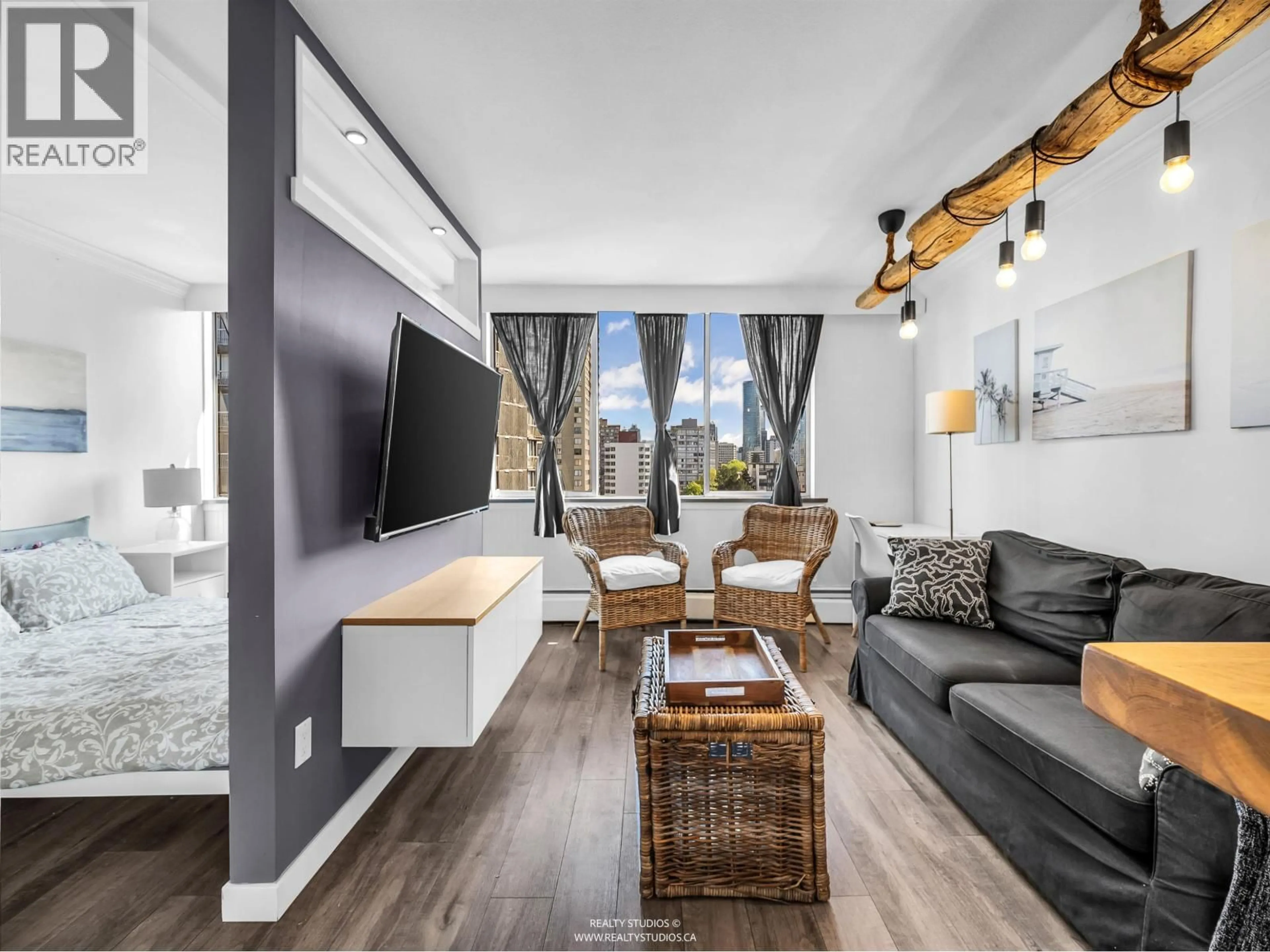 Living room with furniture, wood/laminate floor for 1205 - 1250 BURNABY STREET, Vancouver British Columbia V6E1P5