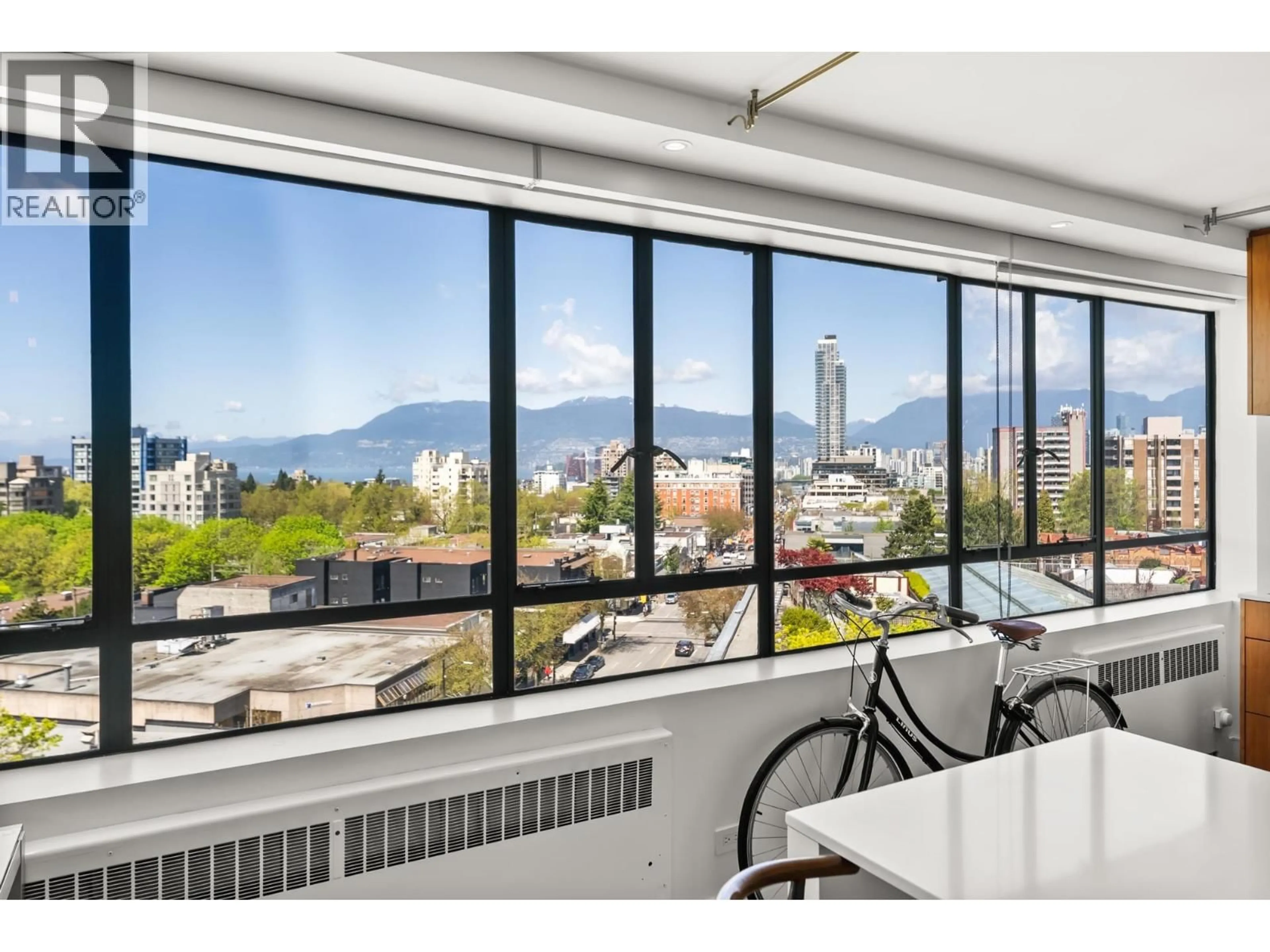 Balcony in the apartment, city buildings view from balcony for 724 - 1445 MARPOLE AVENUE, Vancouver British Columbia V6H1S5