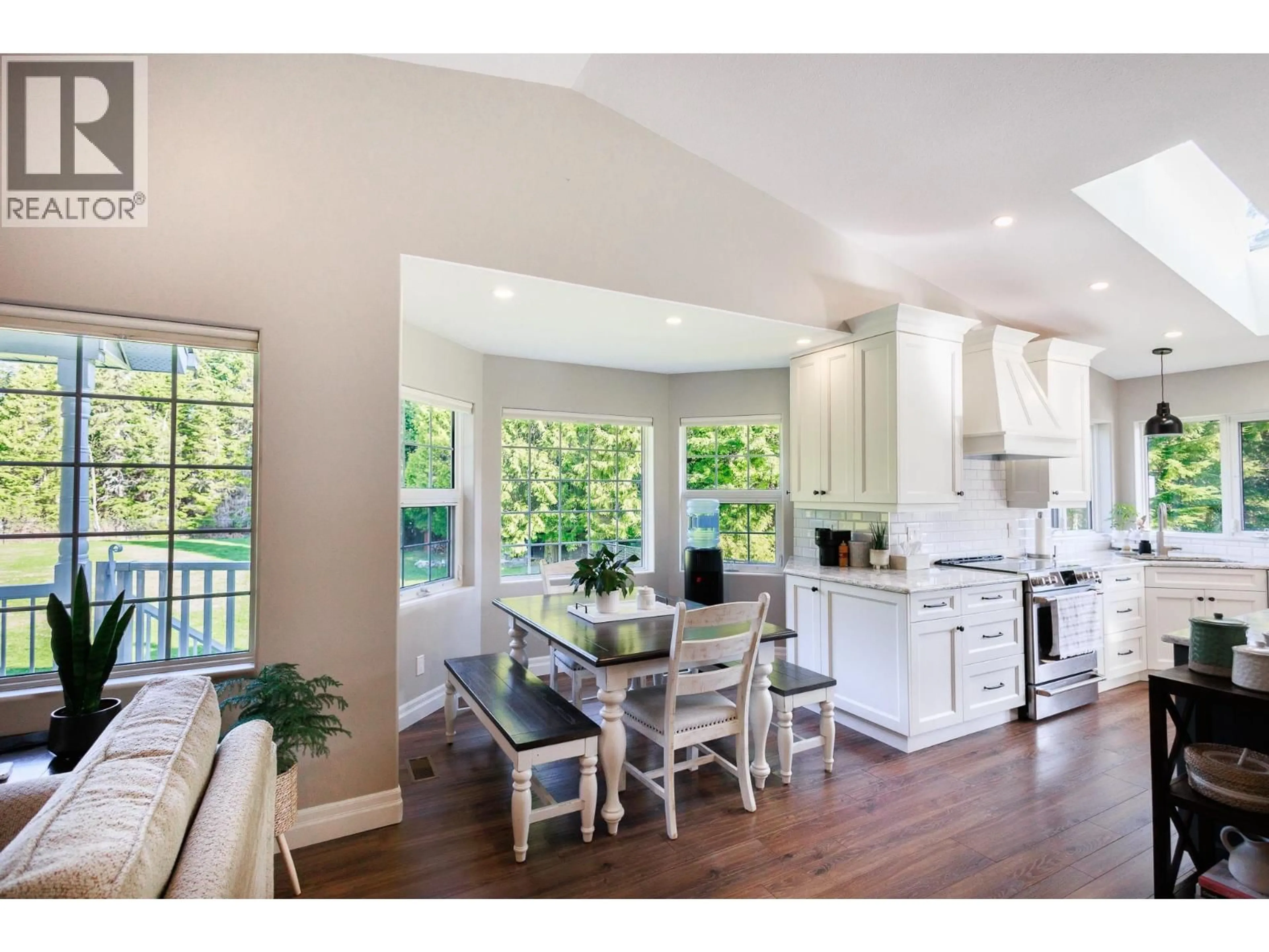 Open concept kitchen, wood/laminate floor for 5360 ANNA STREET, Terrace British Columbia V8G0C3