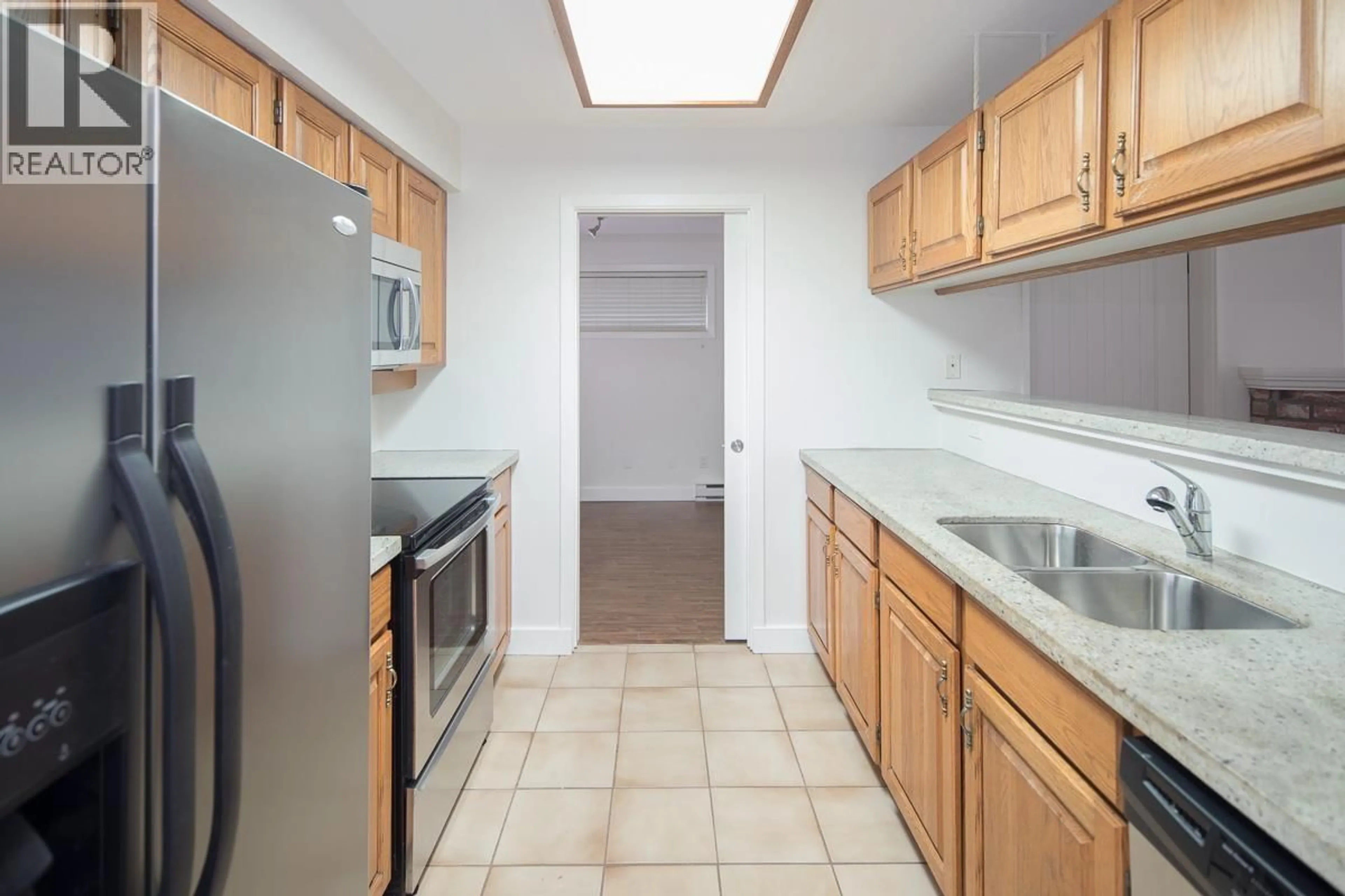 Standard kitchen, ceramic/tile floor for 27 - 3980 CANADA WAY, Burnaby British Columbia V5G1G7