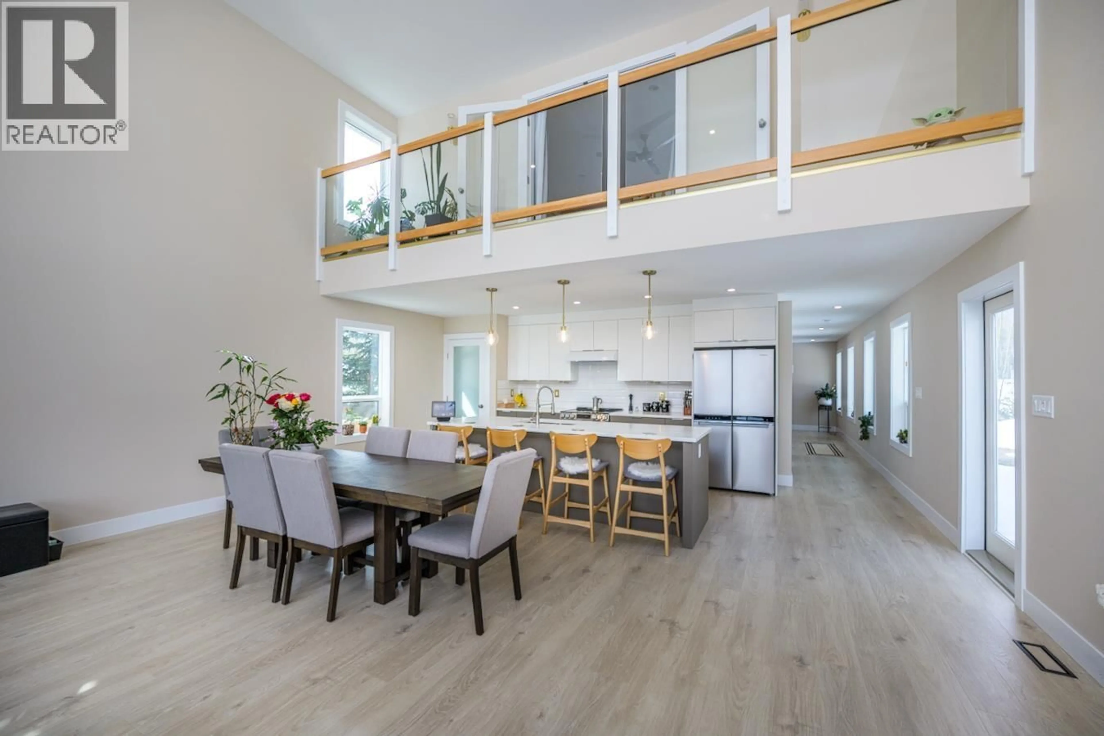 Open concept kitchen, wood/laminate floor for 28240 NESS LAKE ROAD, Prince George British Columbia V2K5N1