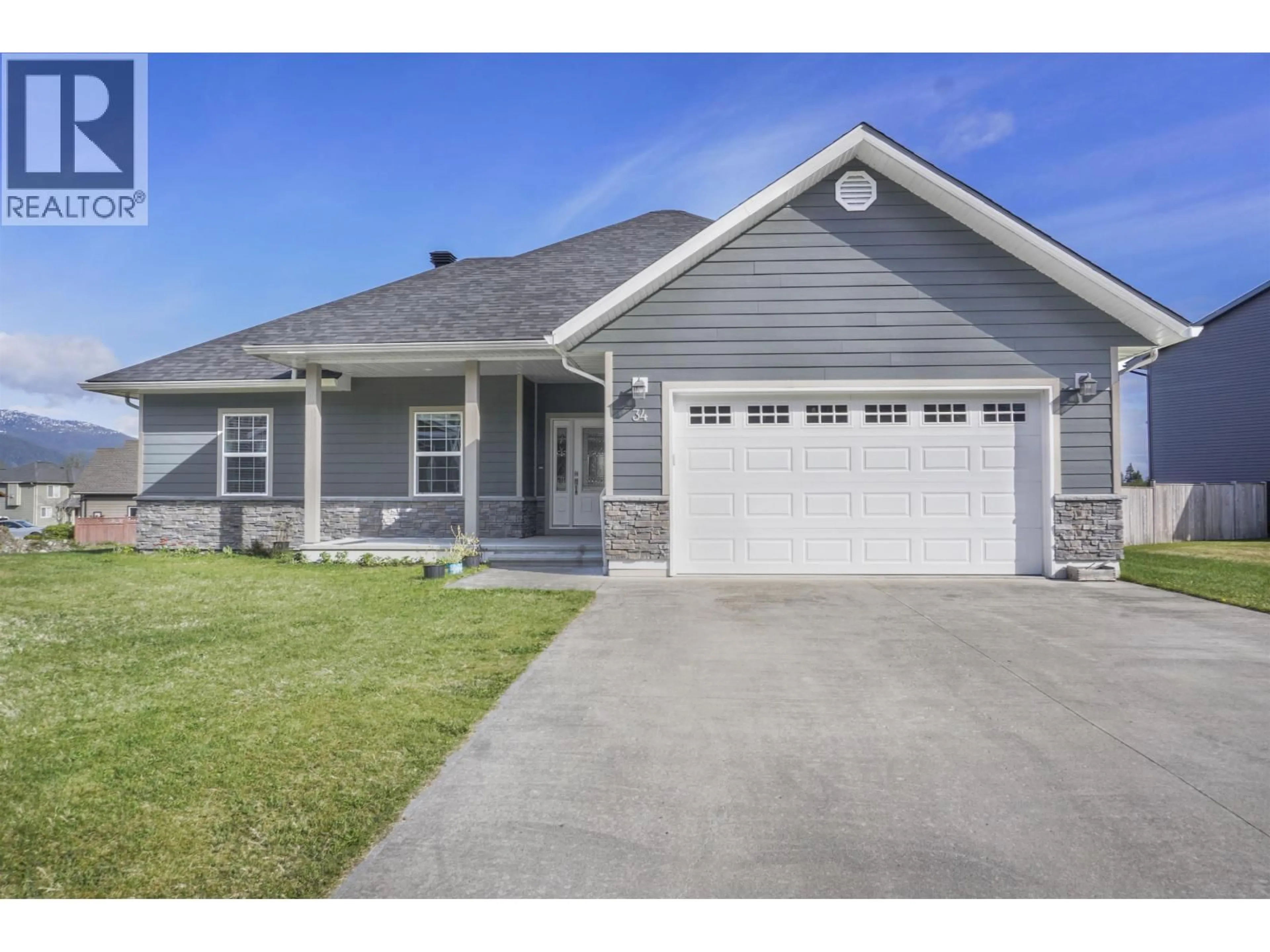 Home with vinyl exterior material, street for 34 WOZNEY STREET, Kitimat British Columbia V8C2S2