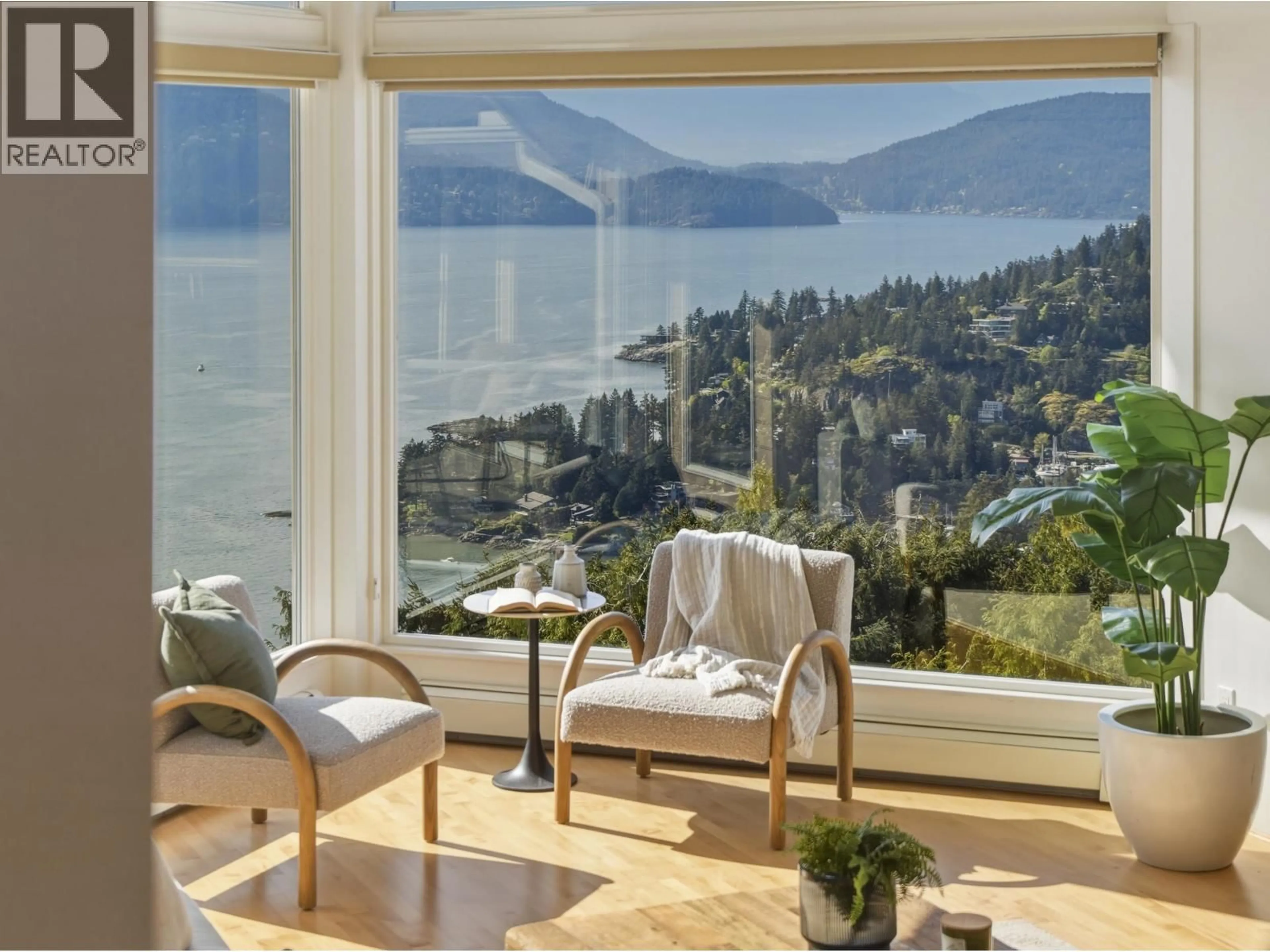 Living room with furniture, wood/laminate floor for 5447 MONTE BRE PLACE, West Vancouver British Columbia V7W3A8