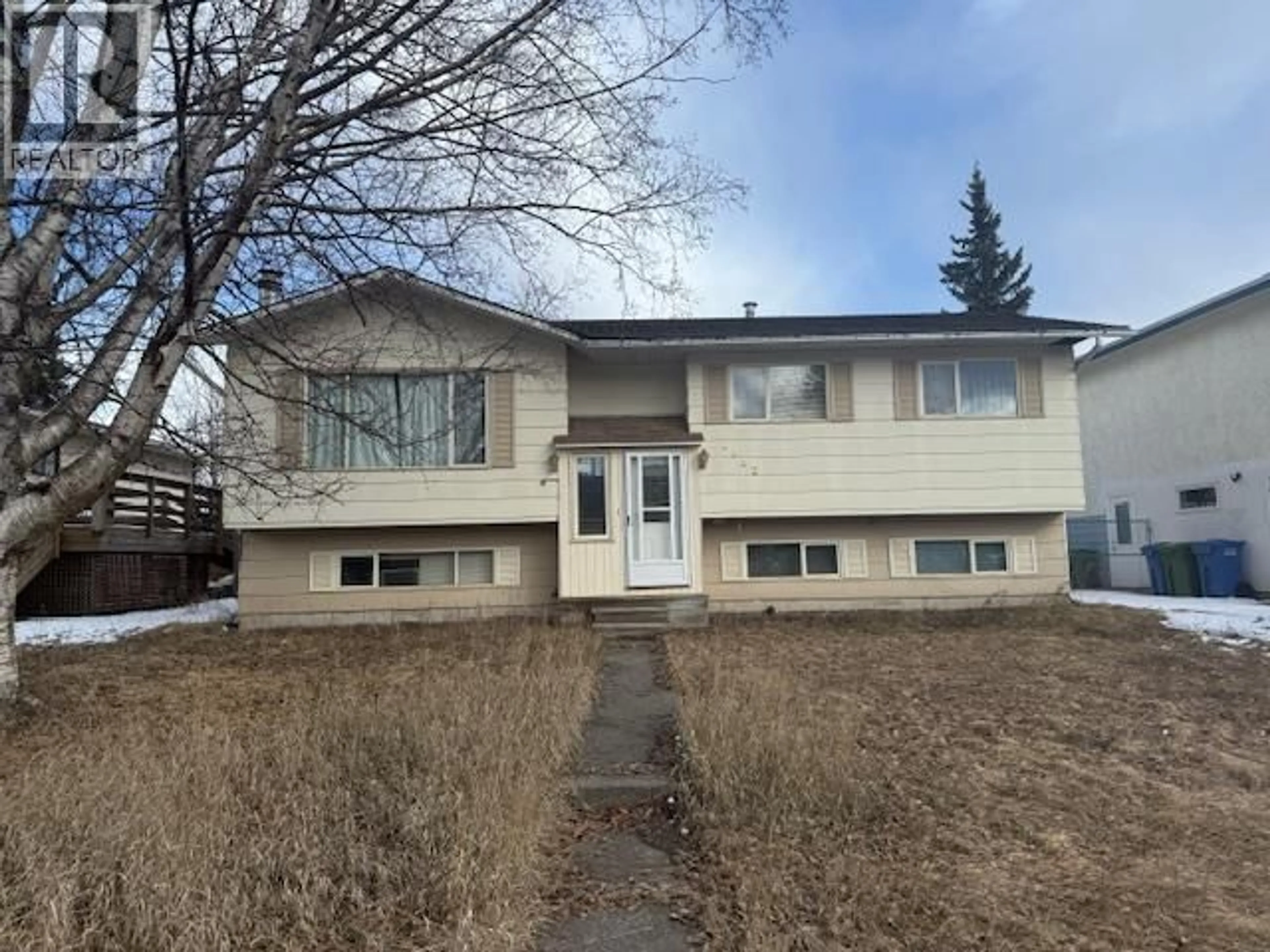 Home with vinyl exterior material, street for 3632 EIGHTEENTH AVENUE, Smithers British Columbia V0J2N0