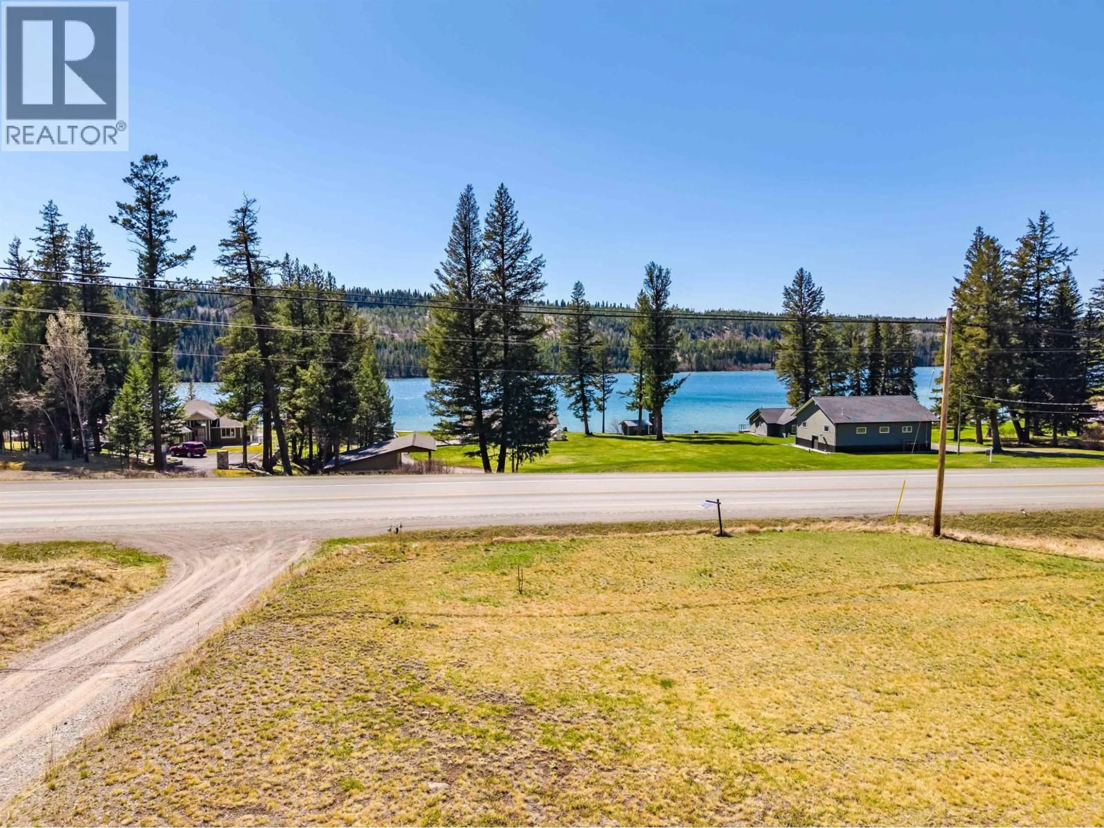 A pic from outside/outdoor area/front of a property/back of a property/a pic from drone, water/lake/river/ocean view for 3559 CARIBOO 97 HIGHWAY, Lac La Hache British Columbia V0K1T1