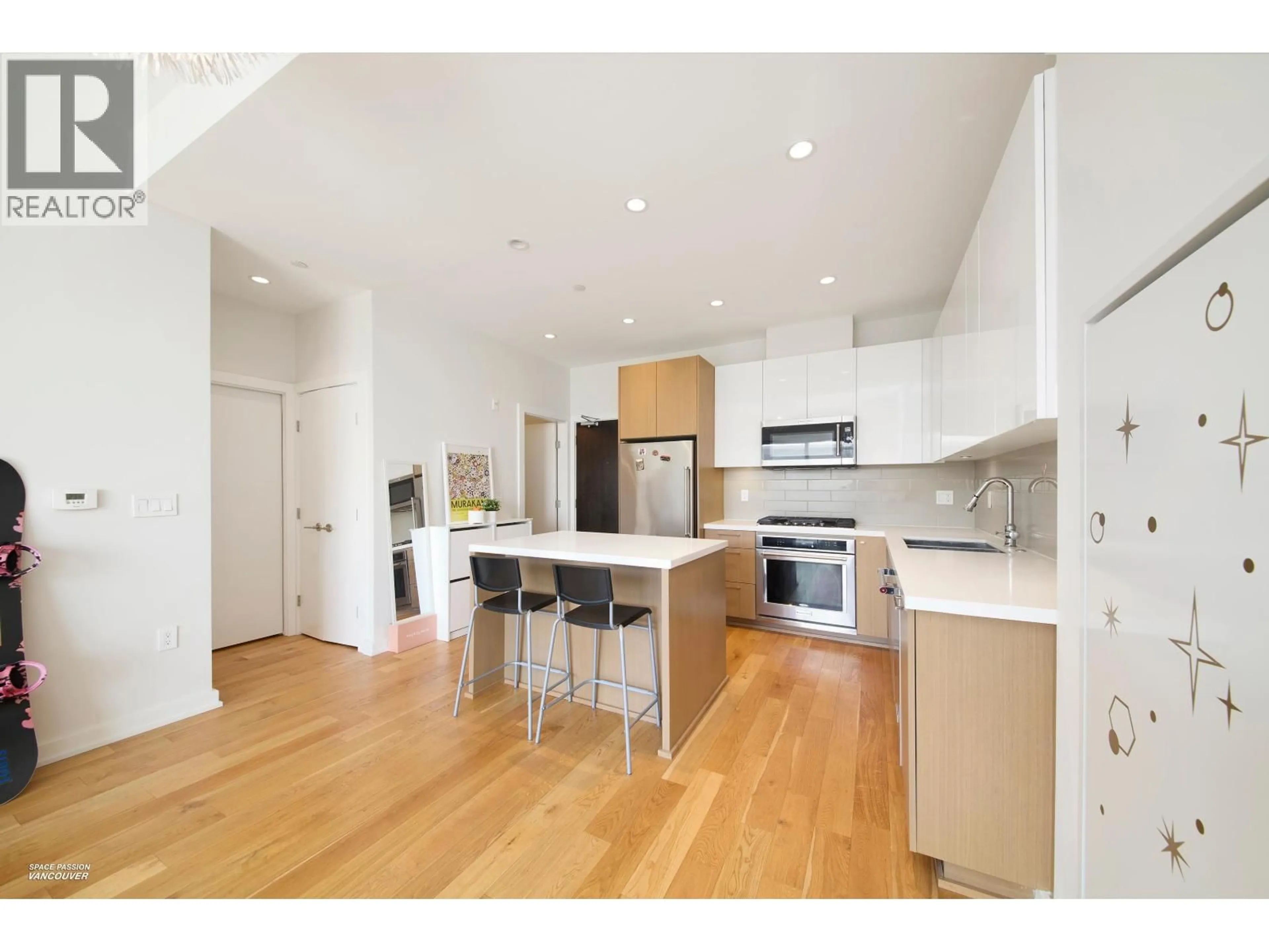 Open concept kitchen, wood/laminate floor for 609 - 5311 CEDARBRIDGE WAY, Richmond British Columbia V6X0M3