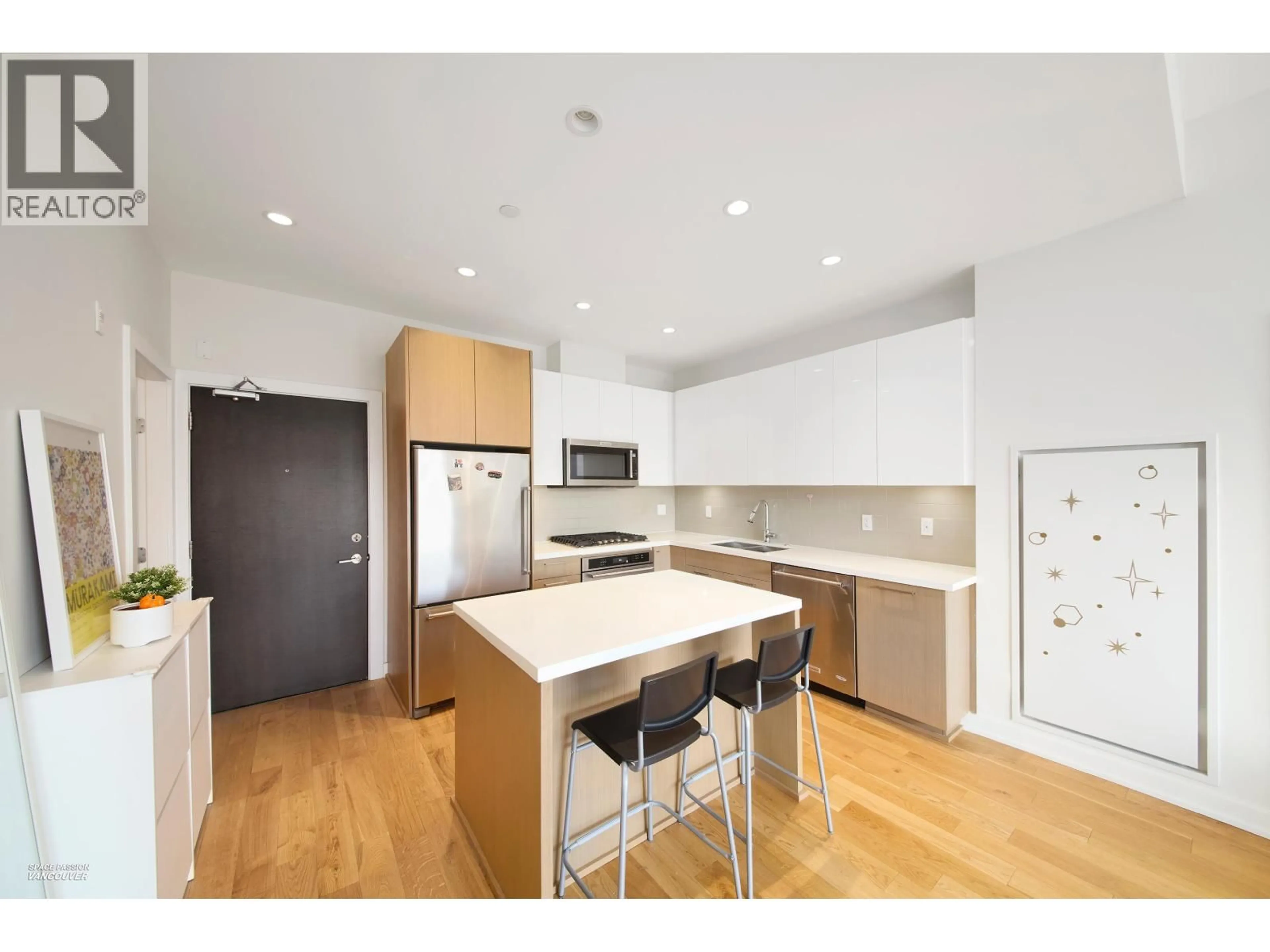 Open concept kitchen, wood/laminate floor for 609 - 5311 CEDARBRIDGE WAY, Richmond British Columbia V6X0M3