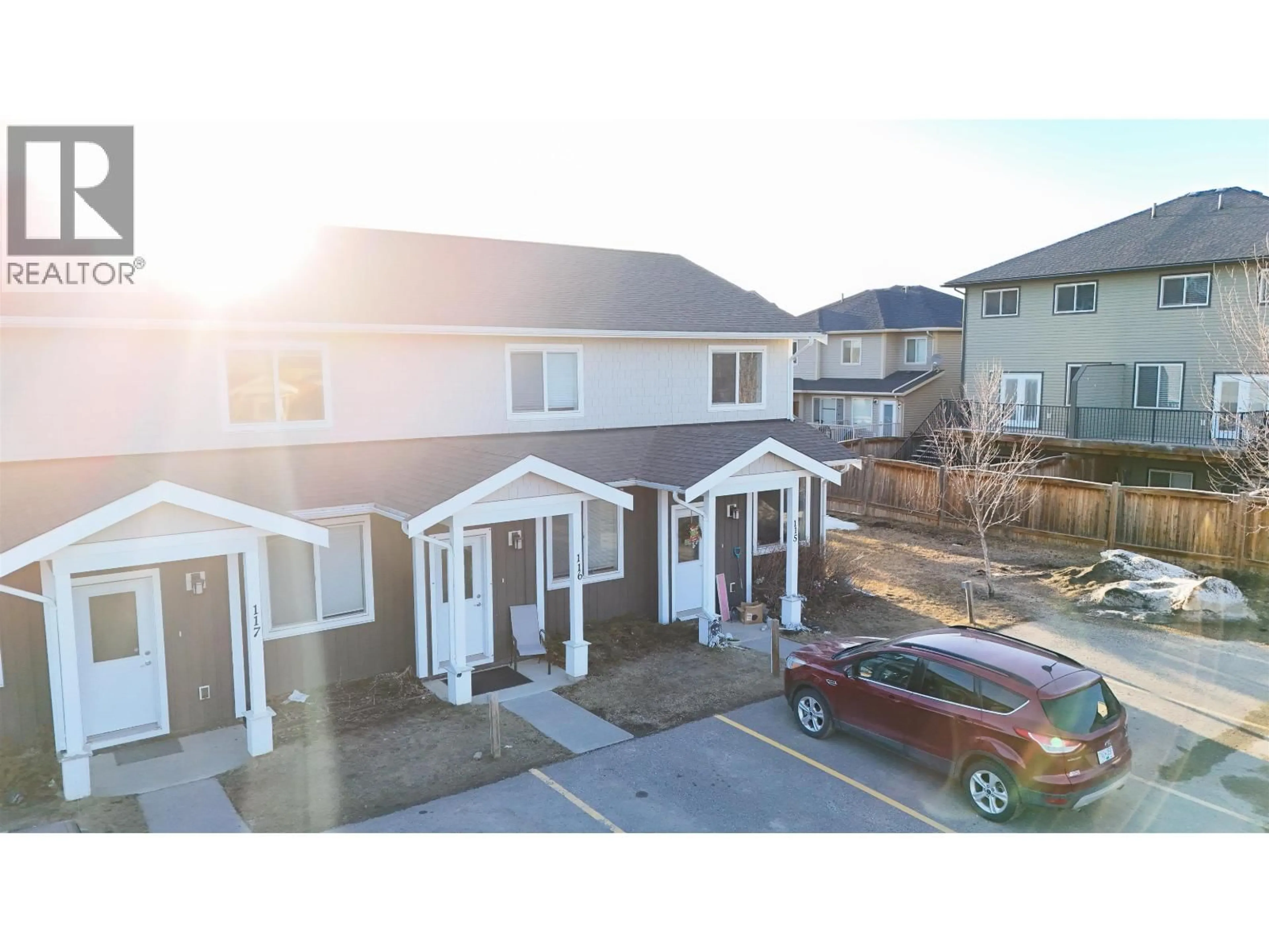 A pic from outside/outdoor area/front of a property/back of a property/a pic from drone, street for 115 - 11008 102 AVENUE, Fort St. John British Columbia V1J2G2