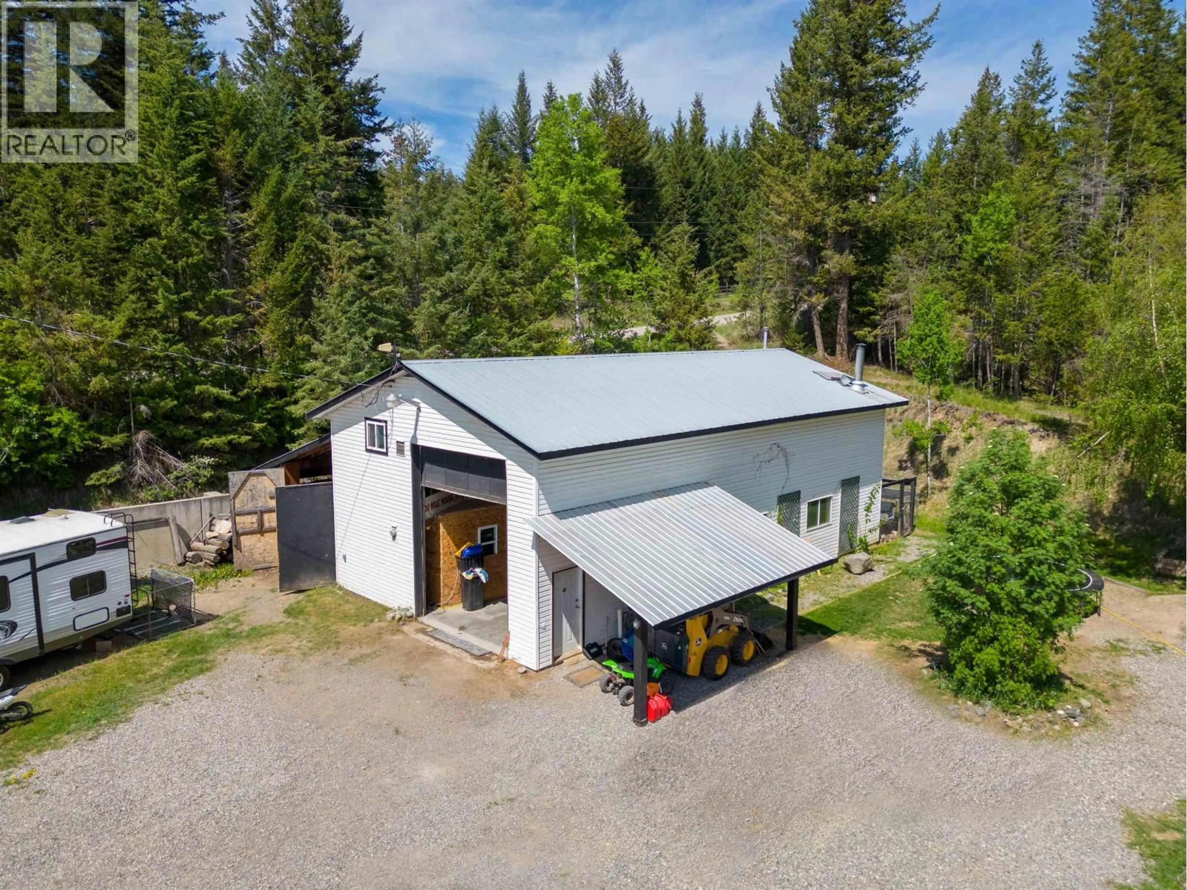 A pic from outside/outdoor area/front of a property/back of a property/a pic from drone, unknown for 5612 CANIM-HENDRIX LAKE ROAD, 100 Mile House British Columbia V0K1M0